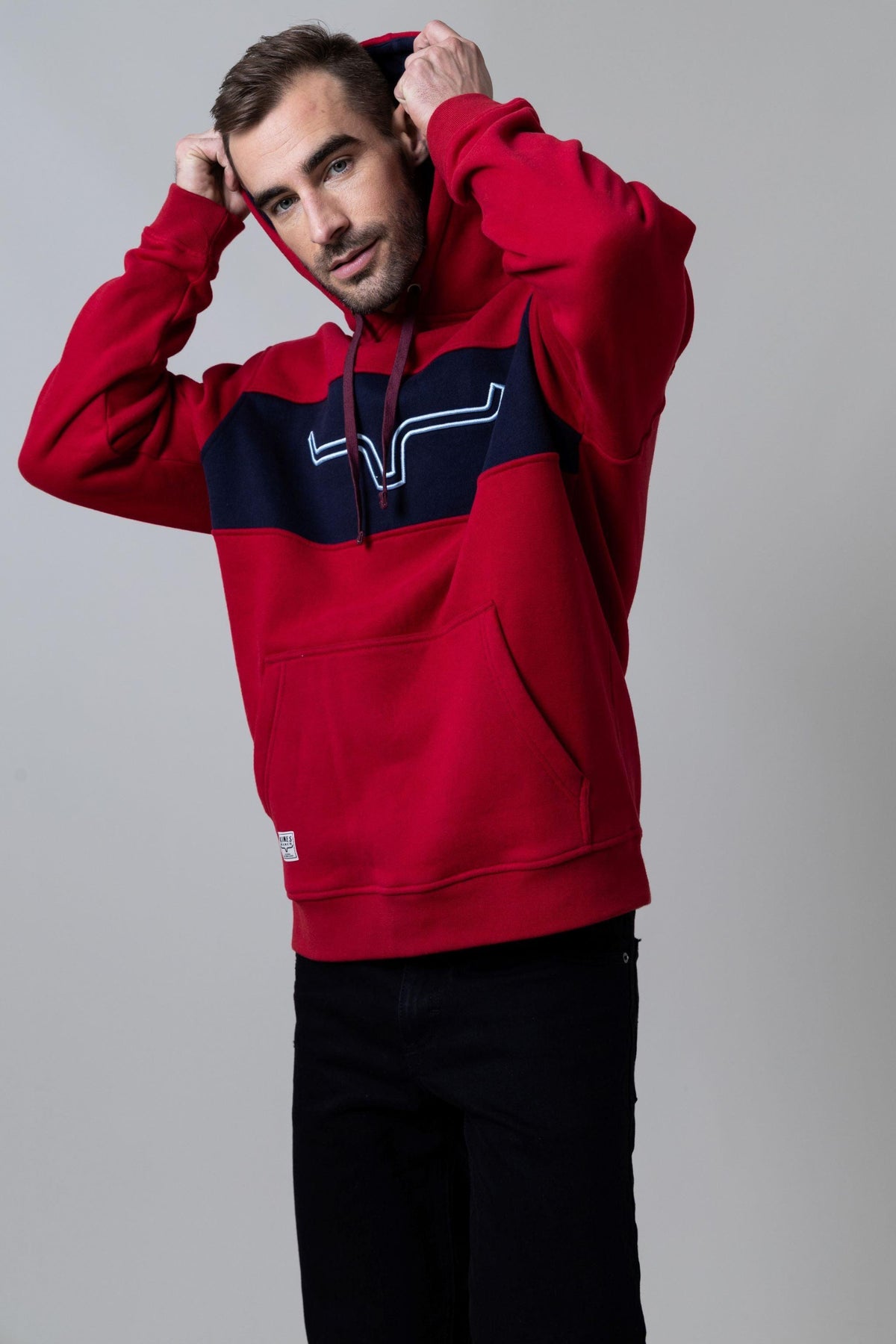 Kimes Ranch Ripon Hoodie in Red with navy chest panel and white logo with kangaroo pocket