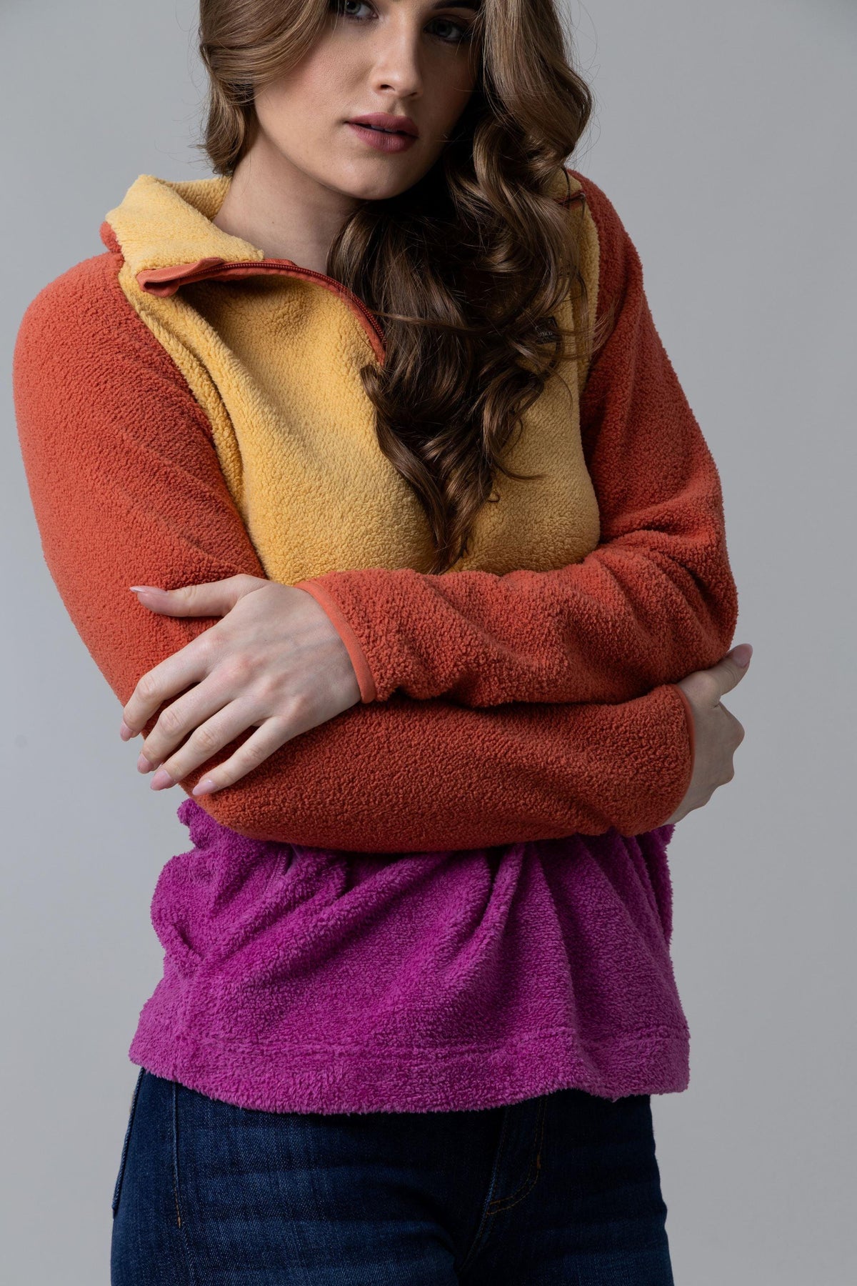 Kimes Ranch Roswell Polar Fleece sweatshirt in Burnt Orange with mustard yellow front panel and purple hem