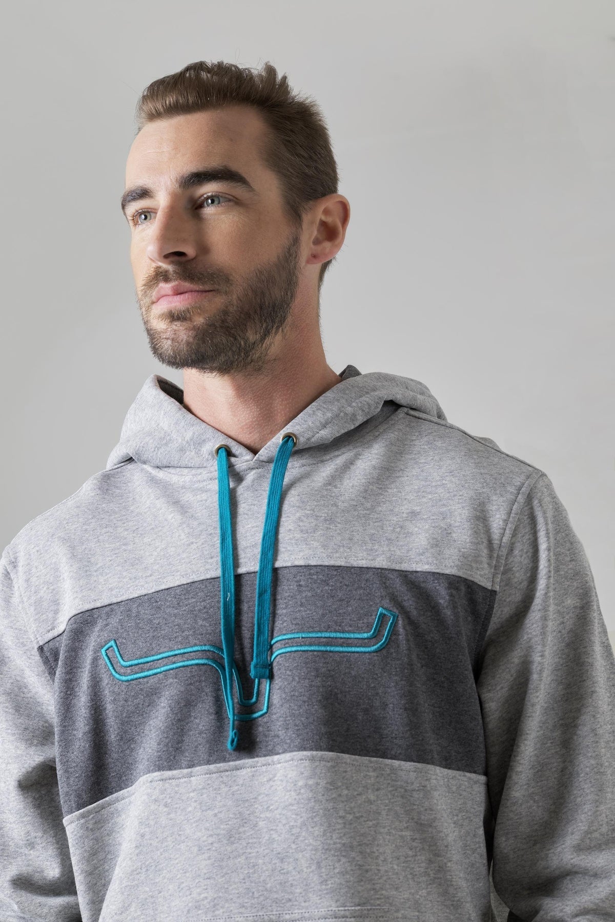 Kimes Ranch Side Winder Hoodie in Grey Heather with a front kangaroo pocket and teal embroidered longhorn logo