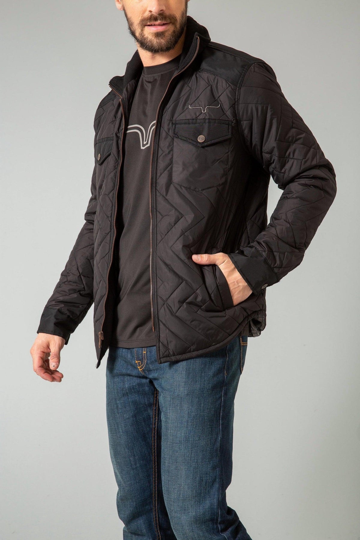 Kimes Ranch Skink Jacket in Black with a chevron quilted pattern and front flap pockets