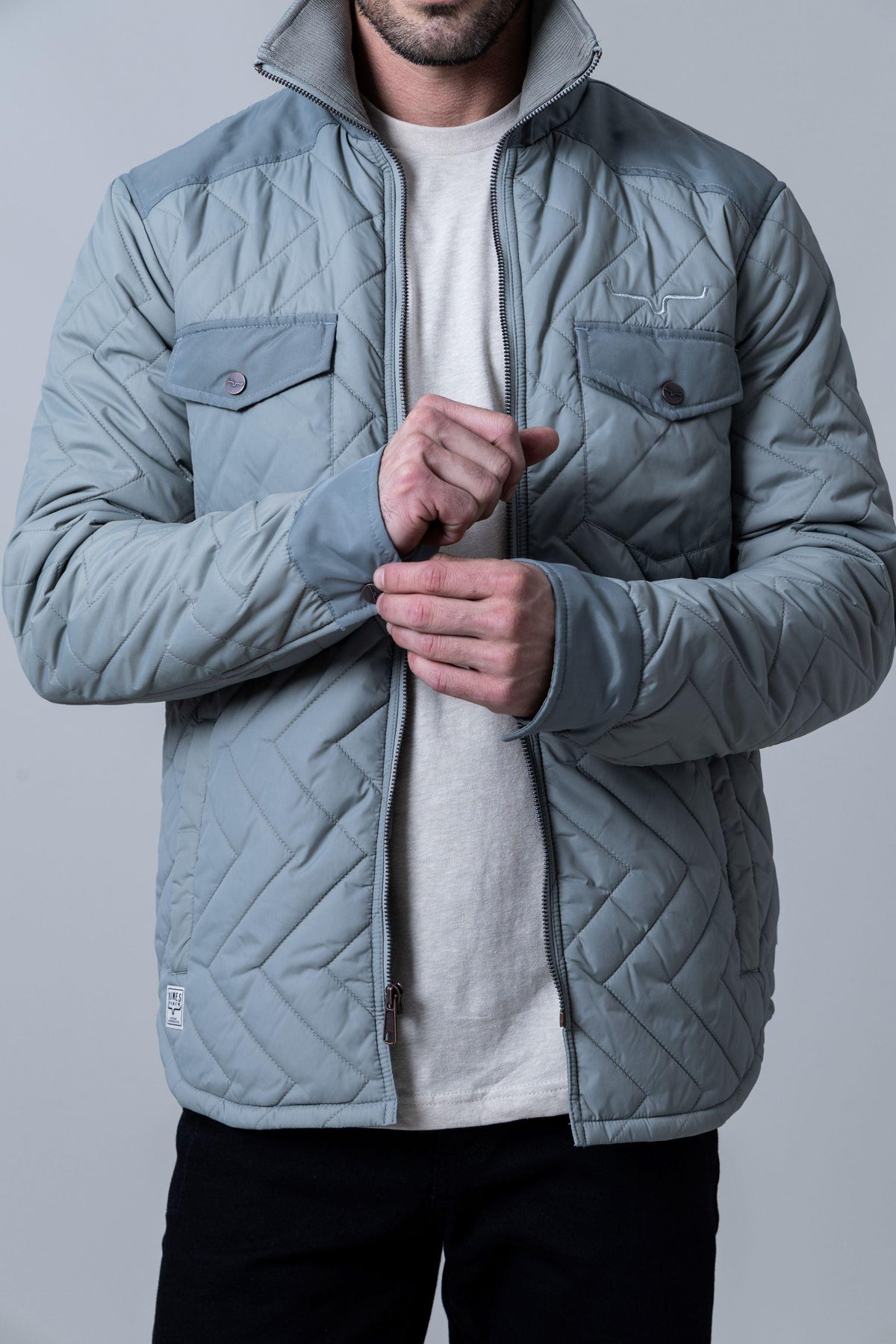 Kimes Ranch Skink Jacket in Sage with chevron quilting and front flap pockets