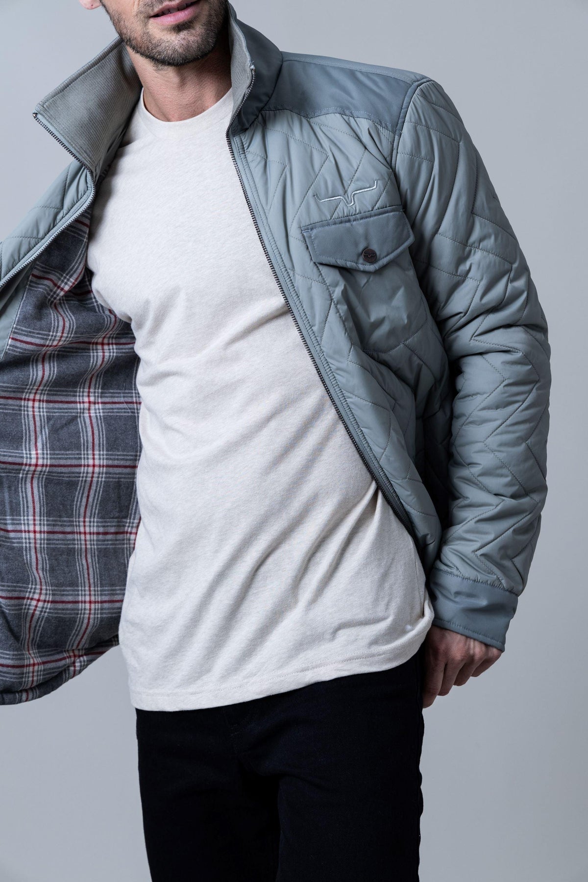 Kimes Ranch Skink Jacket in Sage with quilted chevron stitching and a plaid lining