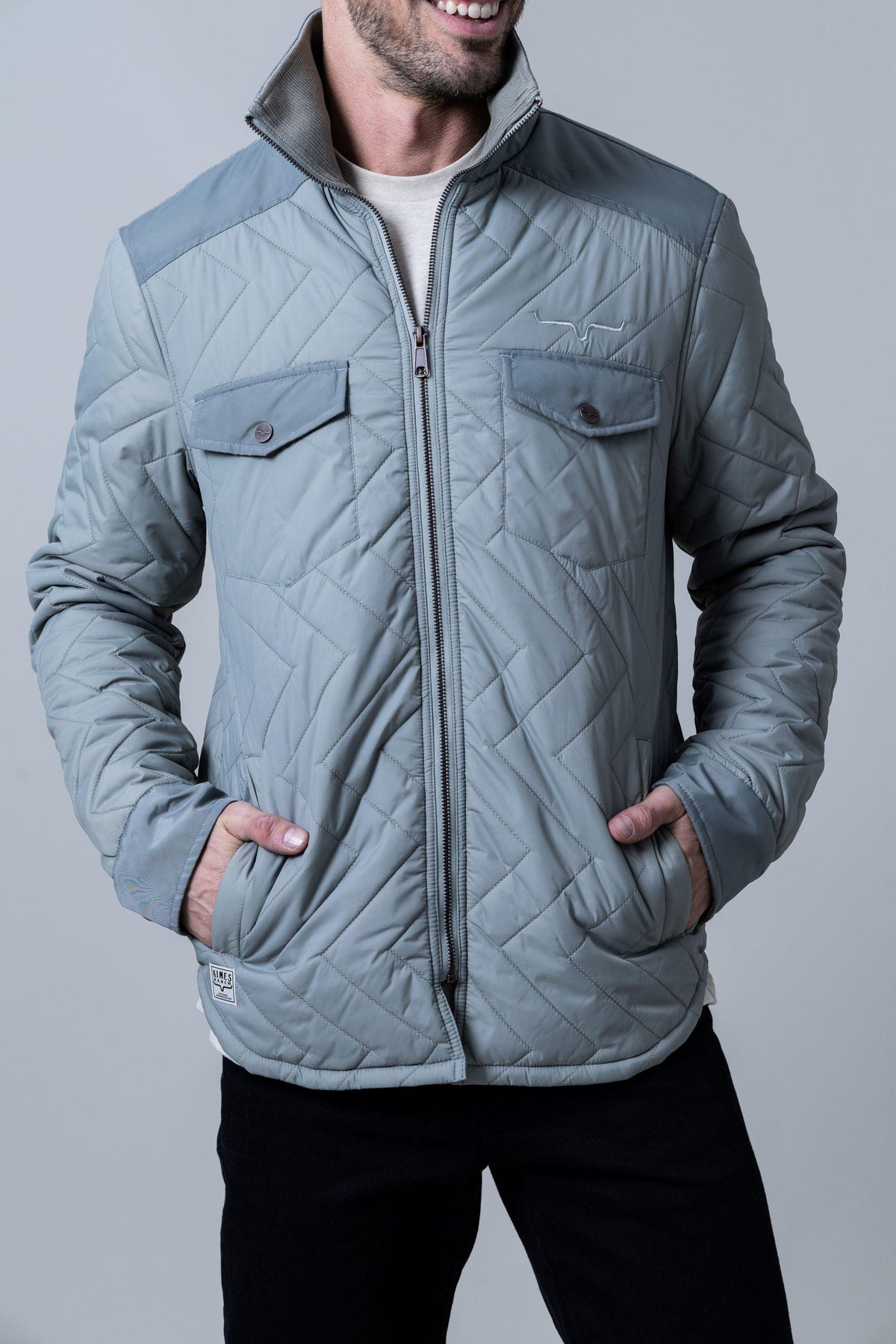 Kimes Ranch Skink Jacket in Sage with a chevron quilted pattern, zip front, and two chest pockets