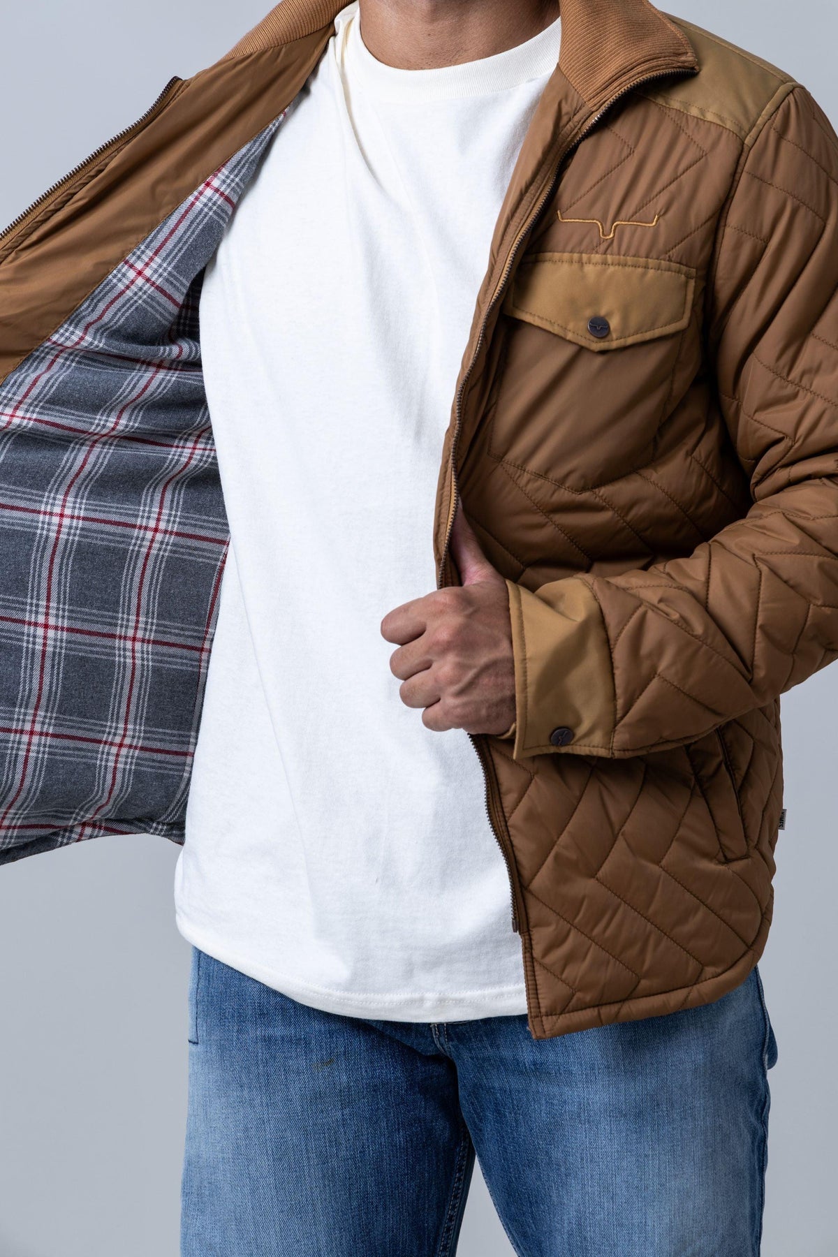 Kimes Ranch Skink Jacket in Work Wear Brown with quilted diamond stitching and plaid lining