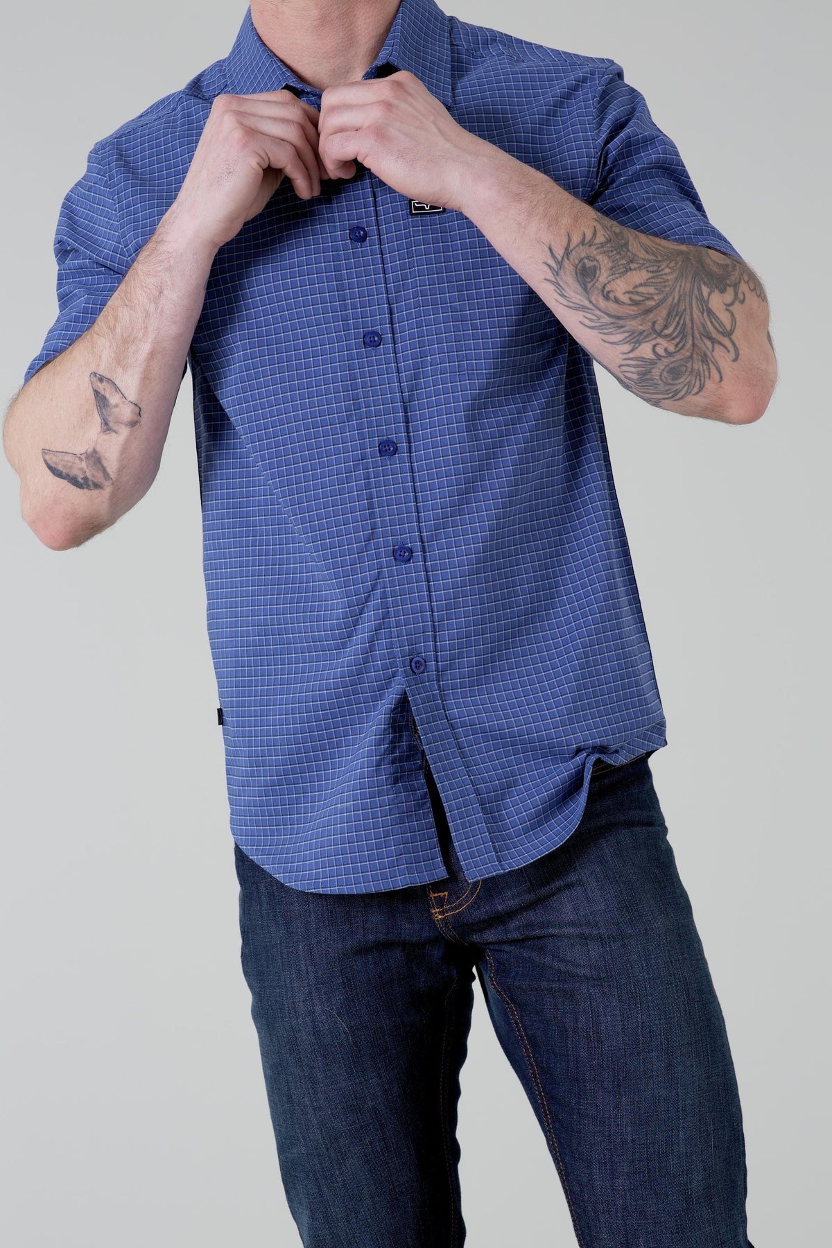 Kimes Ranch Spyglass Short Sleeve Dress Shirt in Blue with a grid pattern and front button closure