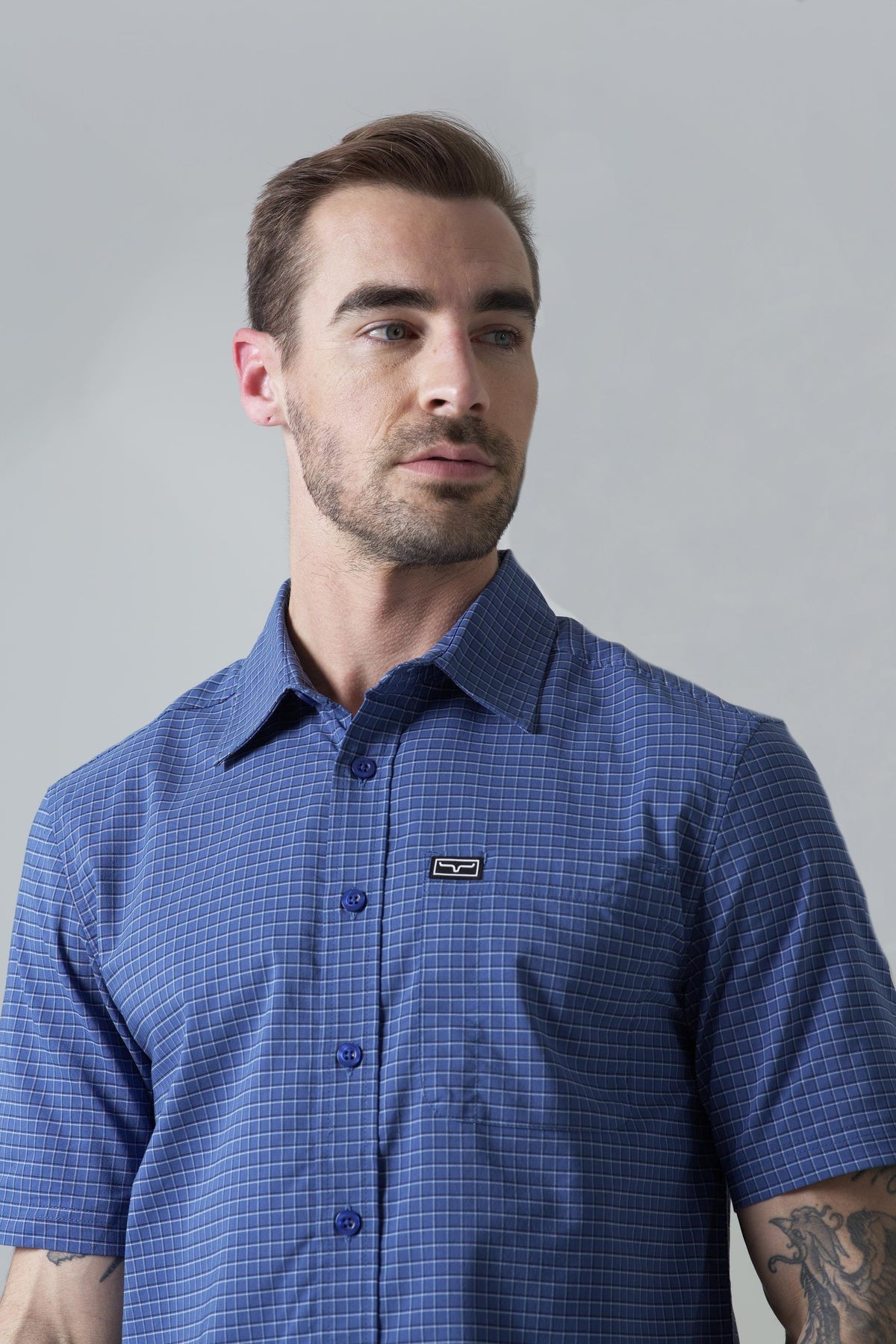 Kimes Ranch Spyglass Short Sleeve Dress Shirt in Blue with a button-down collar and chest pocket