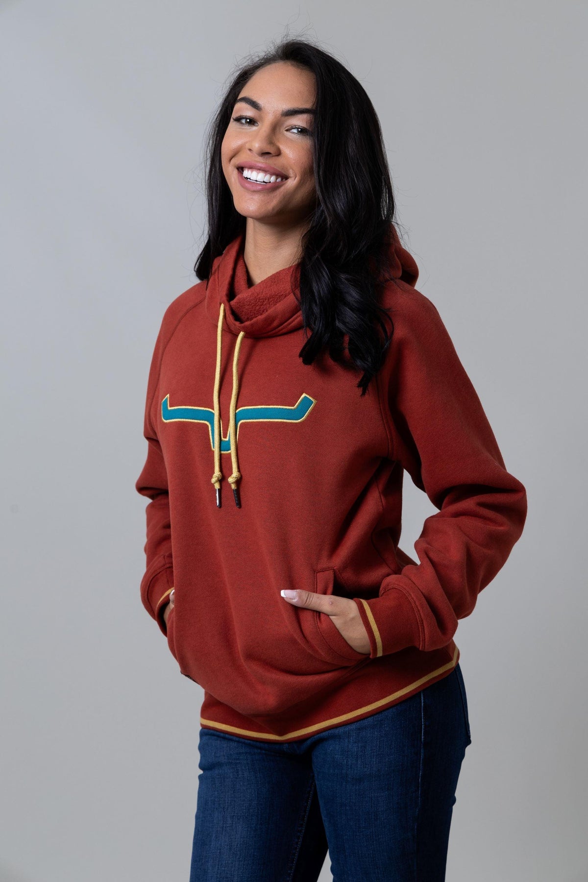 Kimes Ranch Two Scoops Hoodie in Rust with a teal and gold logo and front kangaroo pocket