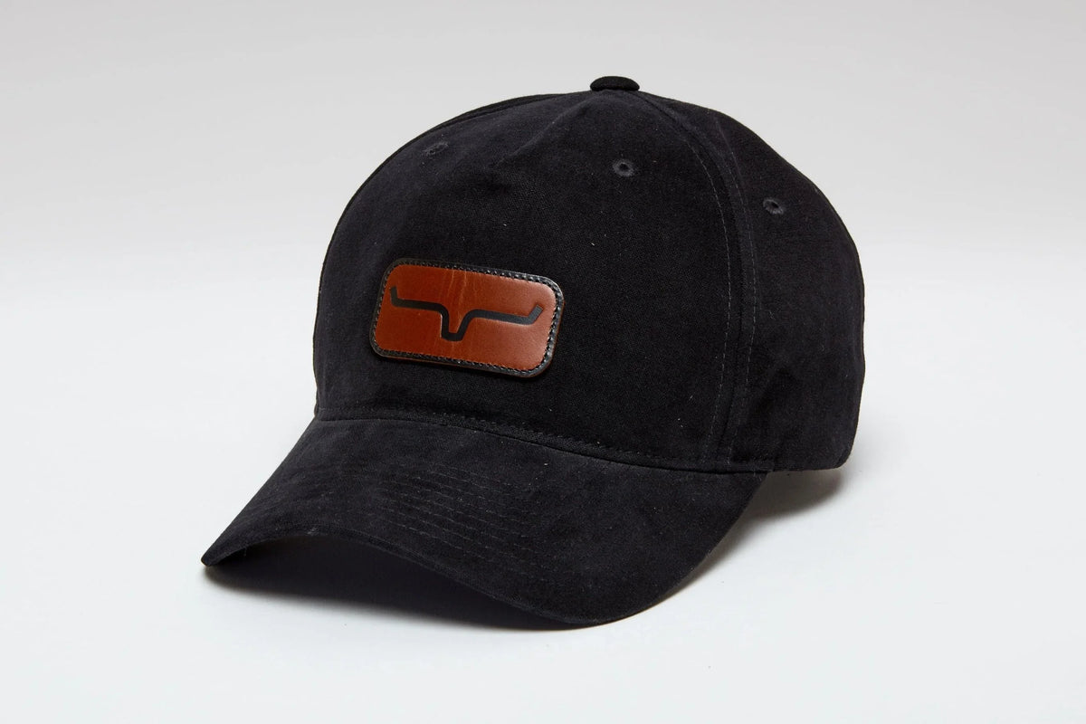 Kimes Ranch Vanguard Hat in Black with a brown logo patch on the front
