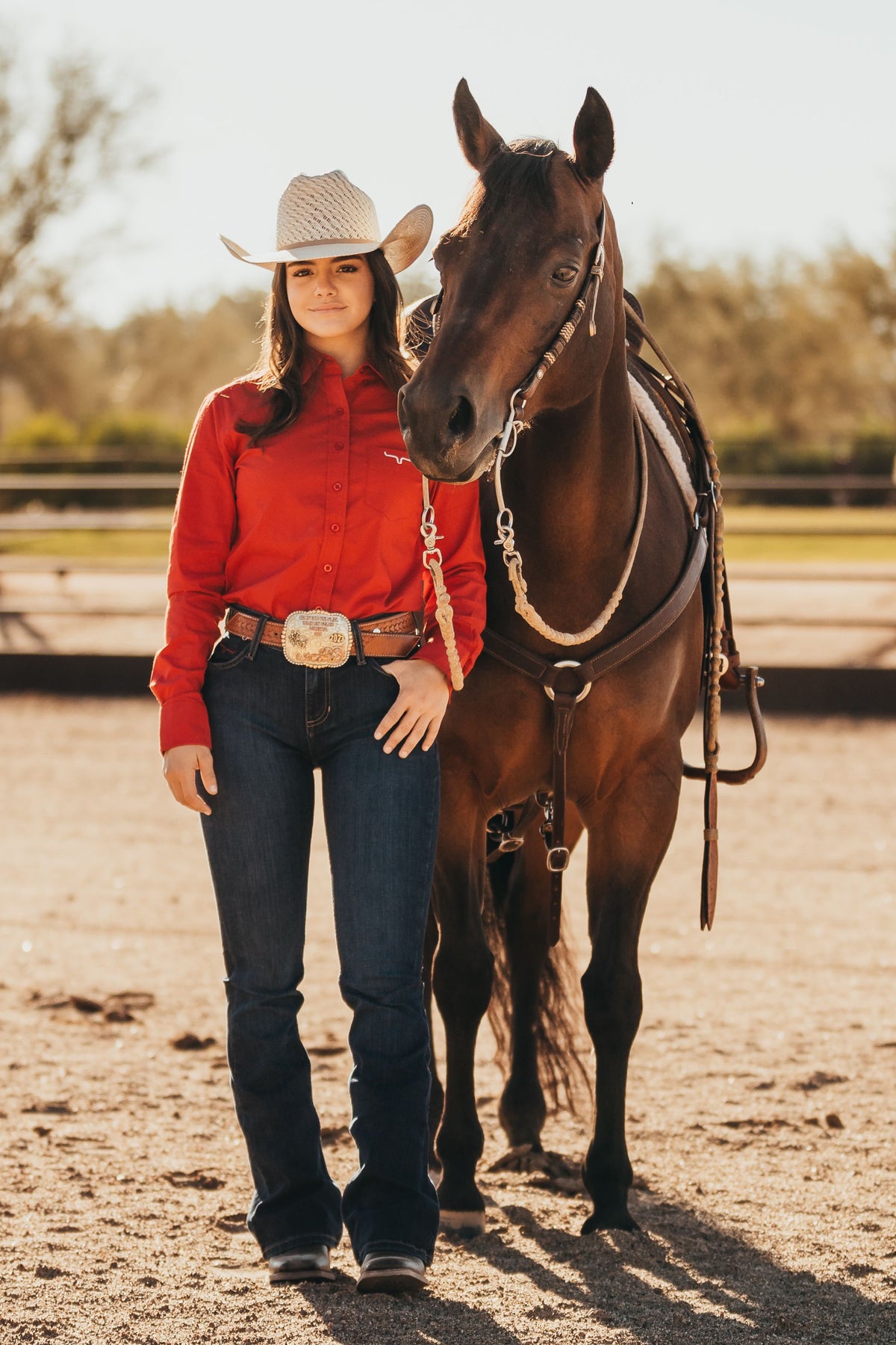 Kimes Ranch Ladies KR Team Shirt in Red with long sleeves and a front logo