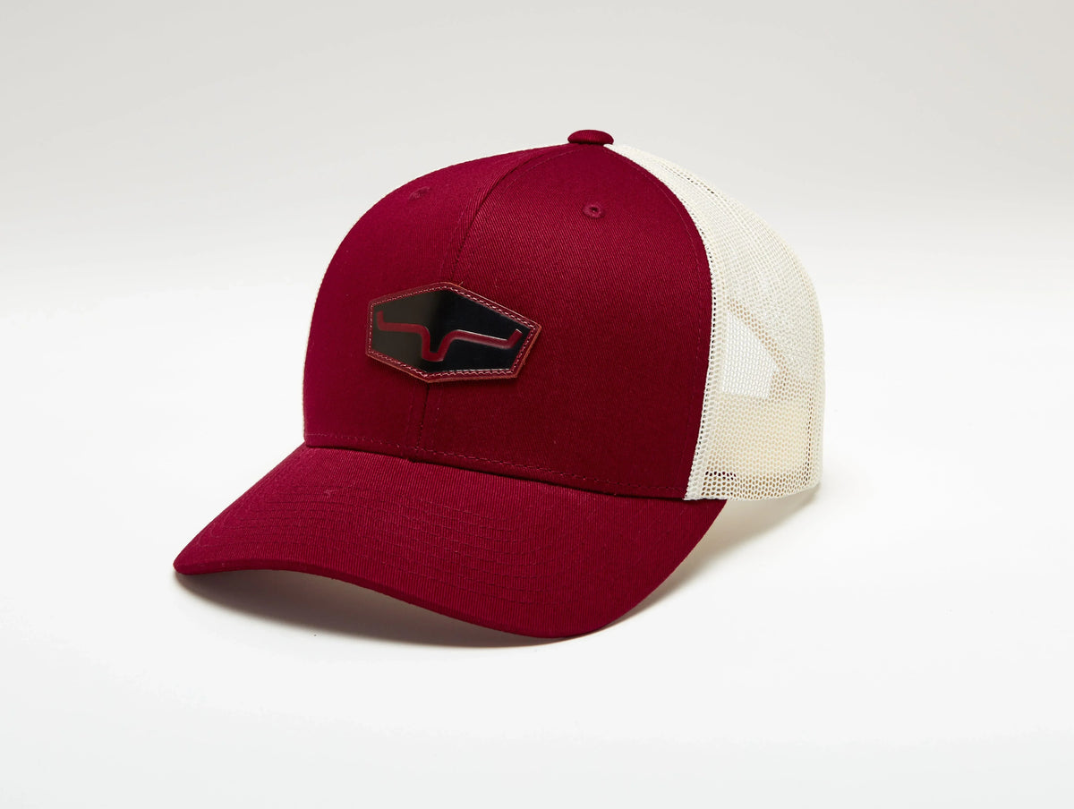Kimes Ranch Box Seats Trucker Hat in Burgundy, side view, with cream mesh back and logo patch