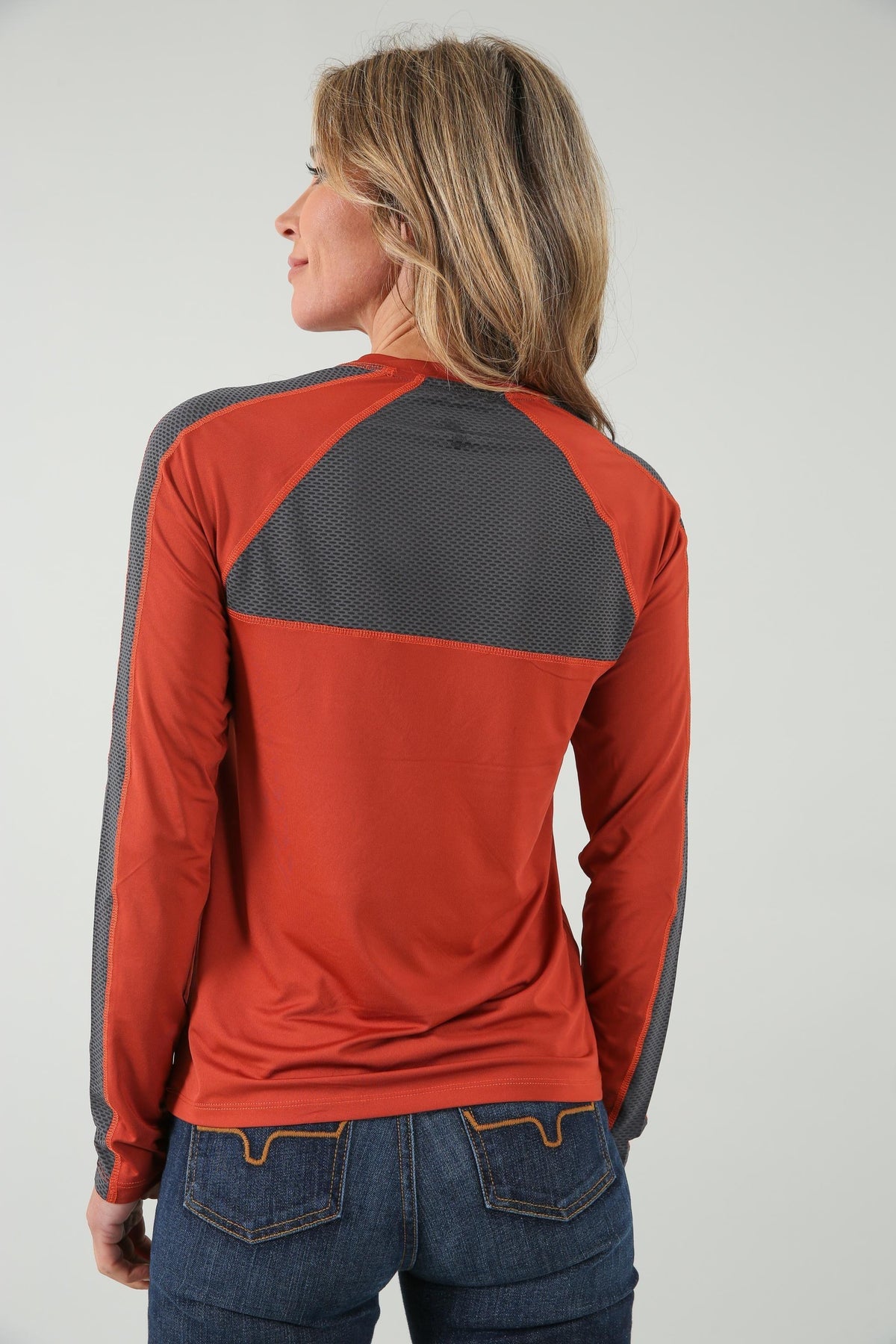 Kimes Ranch K1 Ls Tech Tee Shirt in Rust, back view, with grey mesh back yoke and sleeve panels