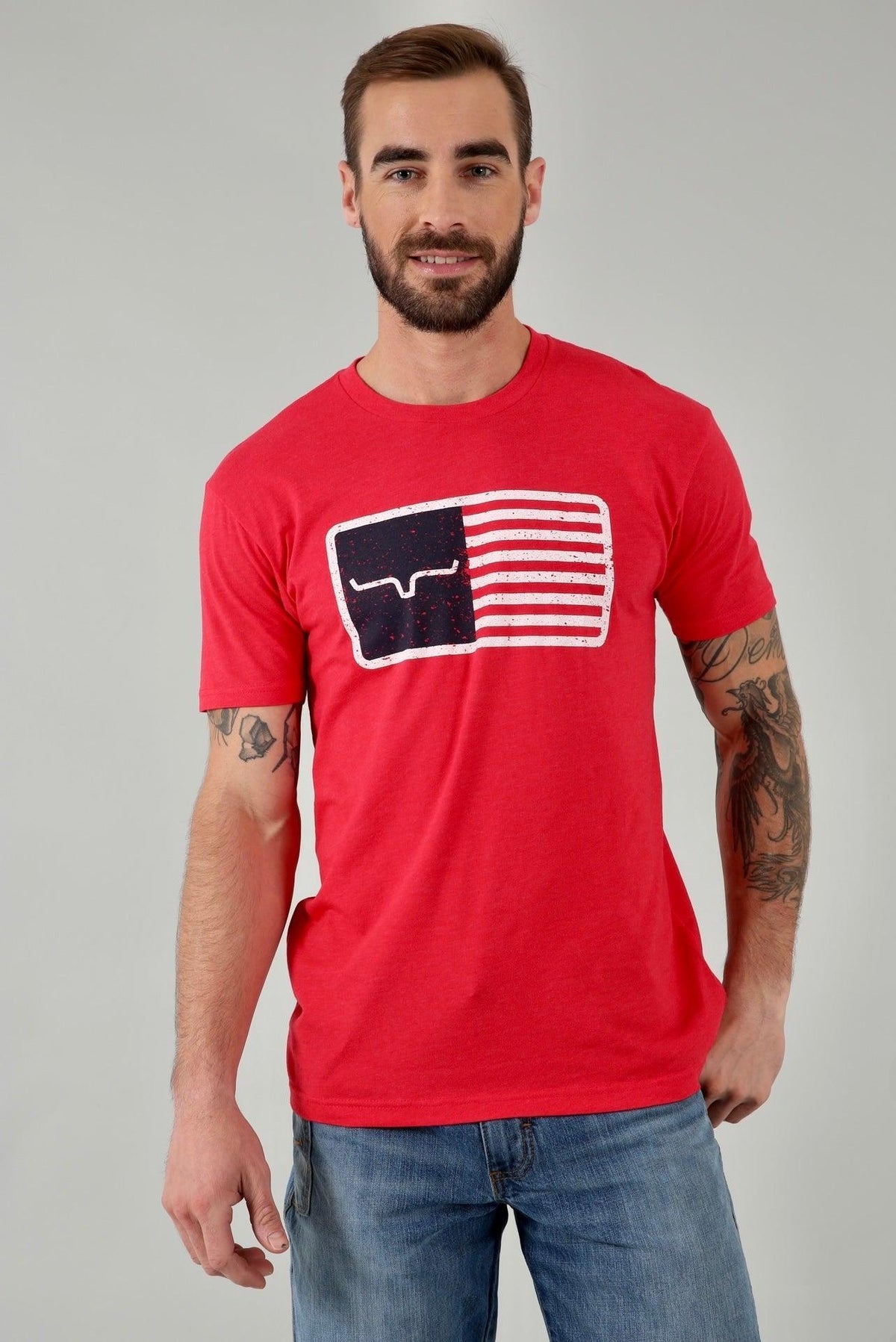Kimes Ranch American Trucker Tee Shirt in red with a distressed flag graphic featuring the Kimes Ranch logo