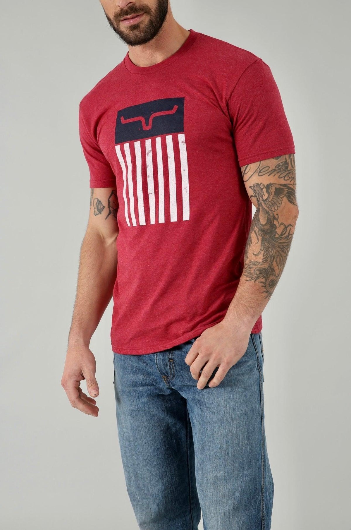 Kimes Ranch Cody Tee Shirt in Cardinal with a graphic featuring the Kimes Ranch logo and white vertical stripes