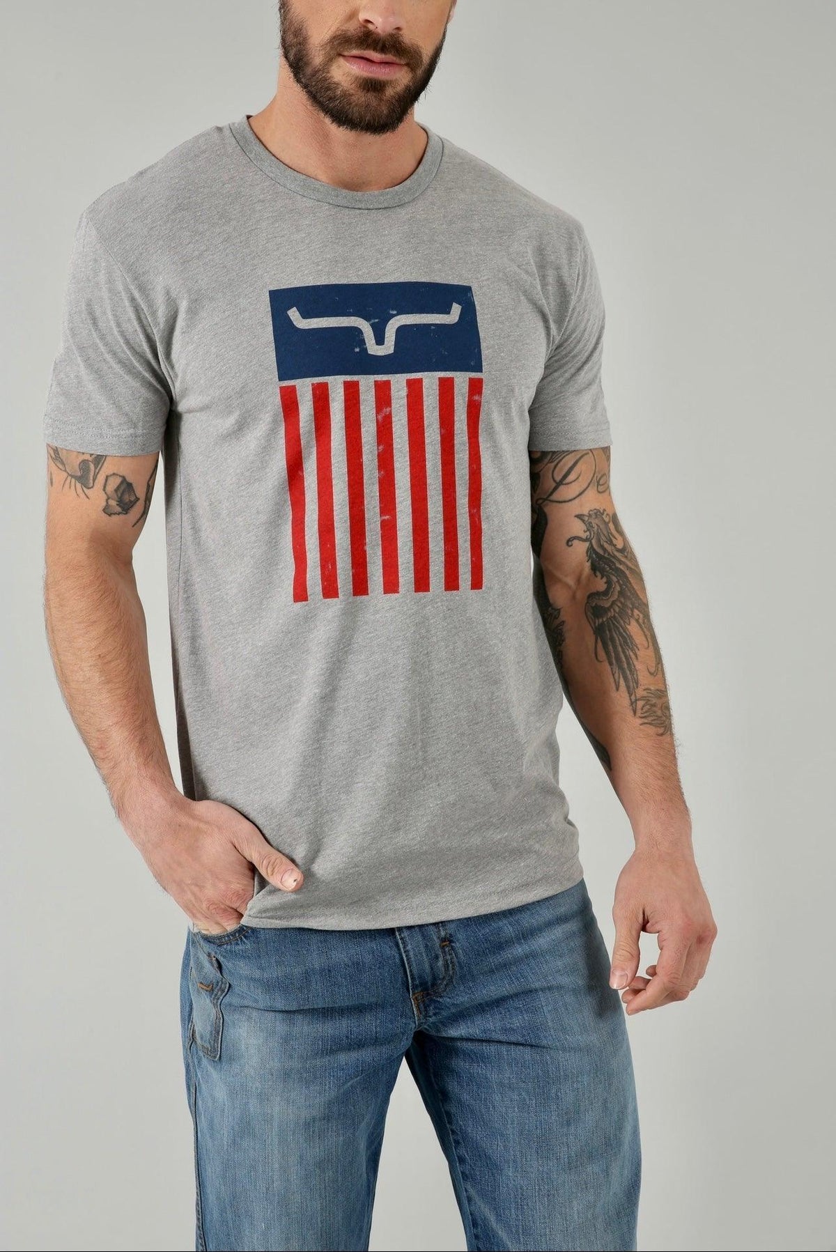 Kimes Ranch Cody Tee Shirt in grey with a distressed American flag graphic featuring the Kimes Ranch logo