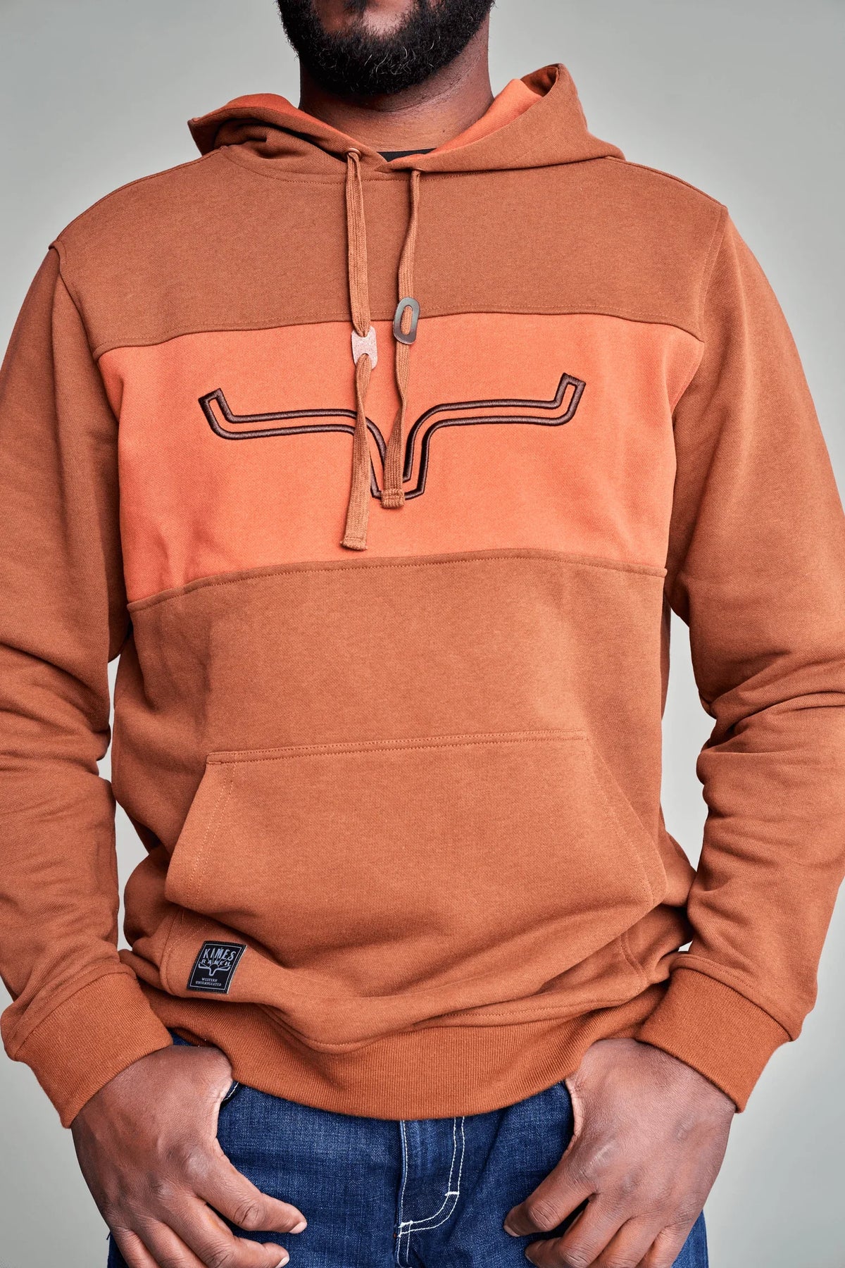 Kimes Ranch Fast Talker Hoodie in Brown with a colorblocked chest panel and embroidered steer logo