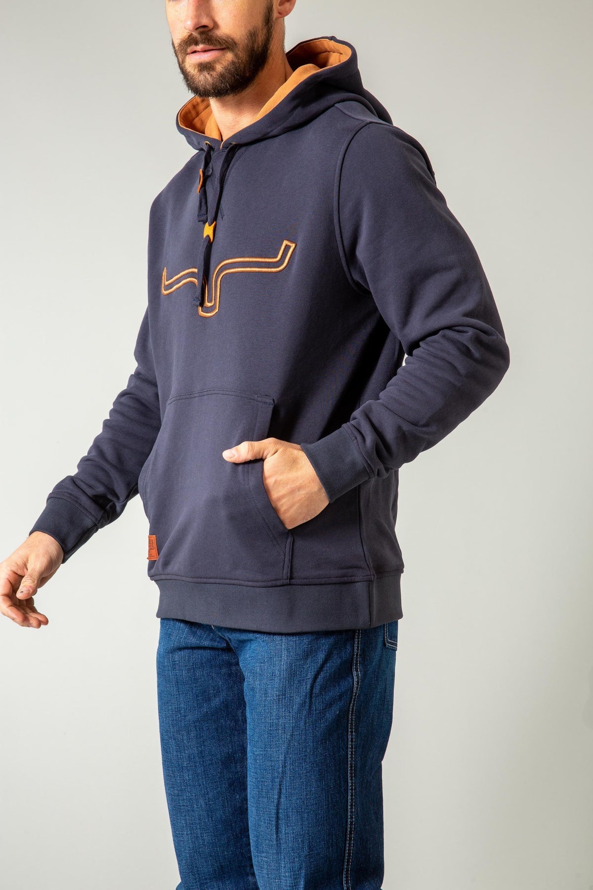 Kimes Ranch Fast Talker Hoodie in Dark Indigo, side view, with a front kangaroo pocket and embroidered logo