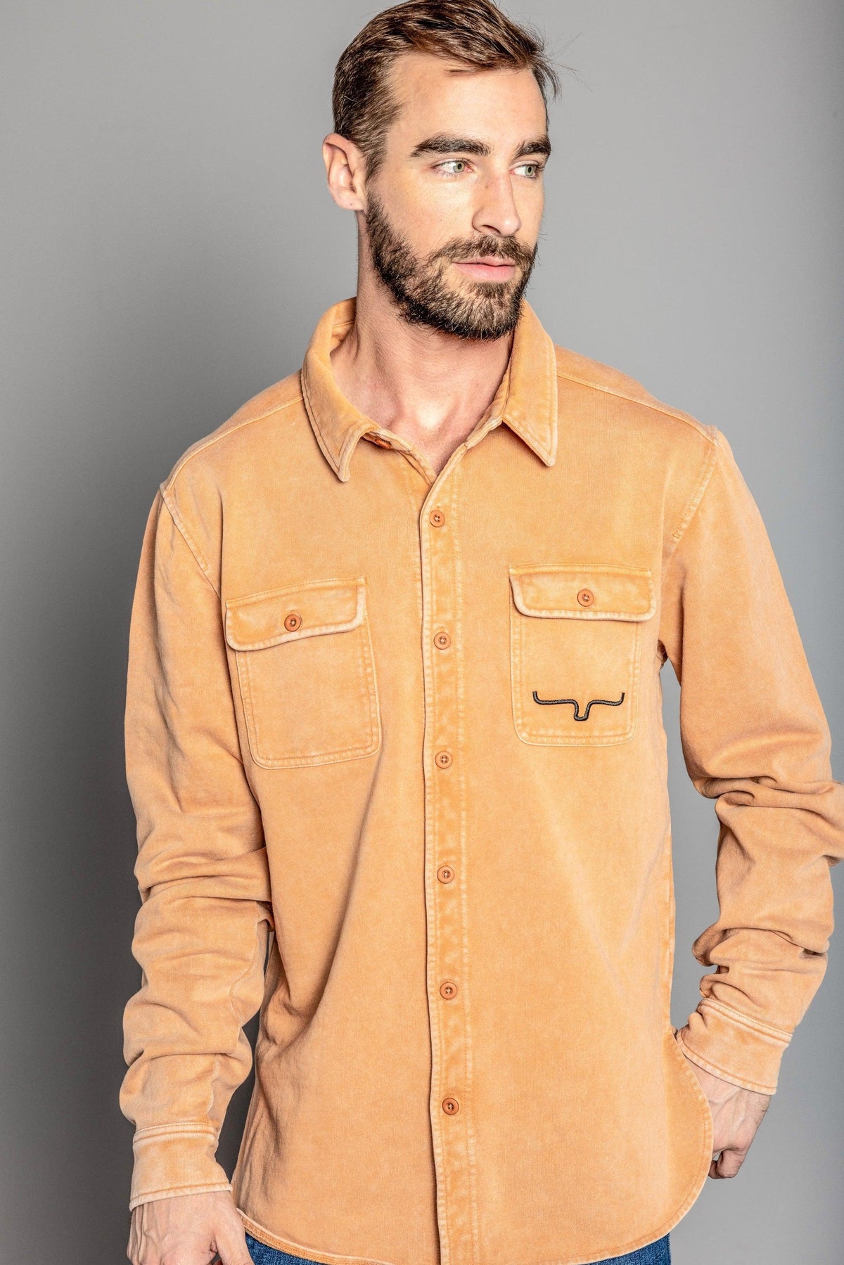 Kimes Ranch Ft Work Shirt Jacket in Work Wear Brown with two button flap pockets and the Kimes Ranch logo on the left pocket