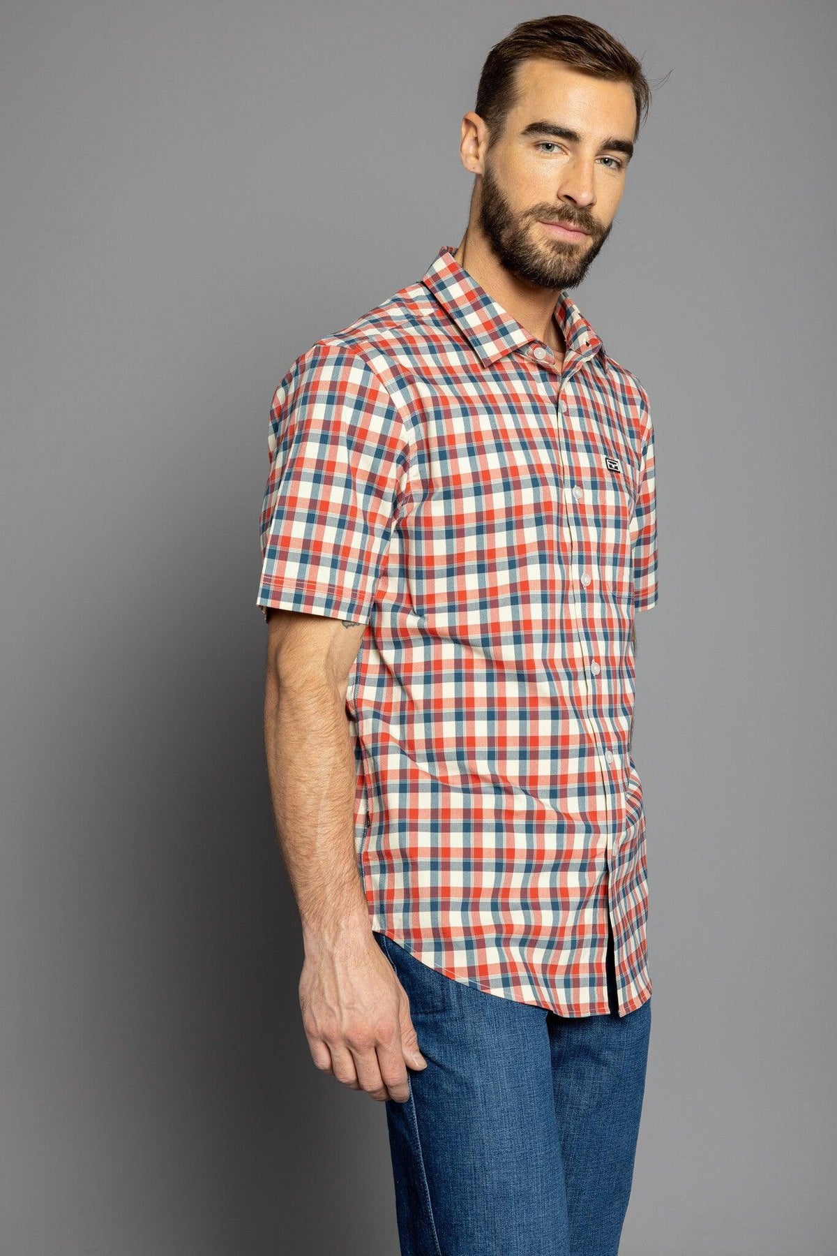 Kimes Ranch Go Round Plaid Dress Shirt in Navy, side view, with short sleeves and a button front