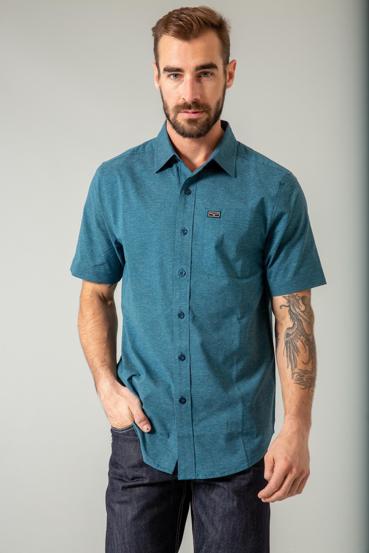 Kimes Ranch Linville Short Sleeve Dress Shirt in Dark Blue with a chest pocket and logo