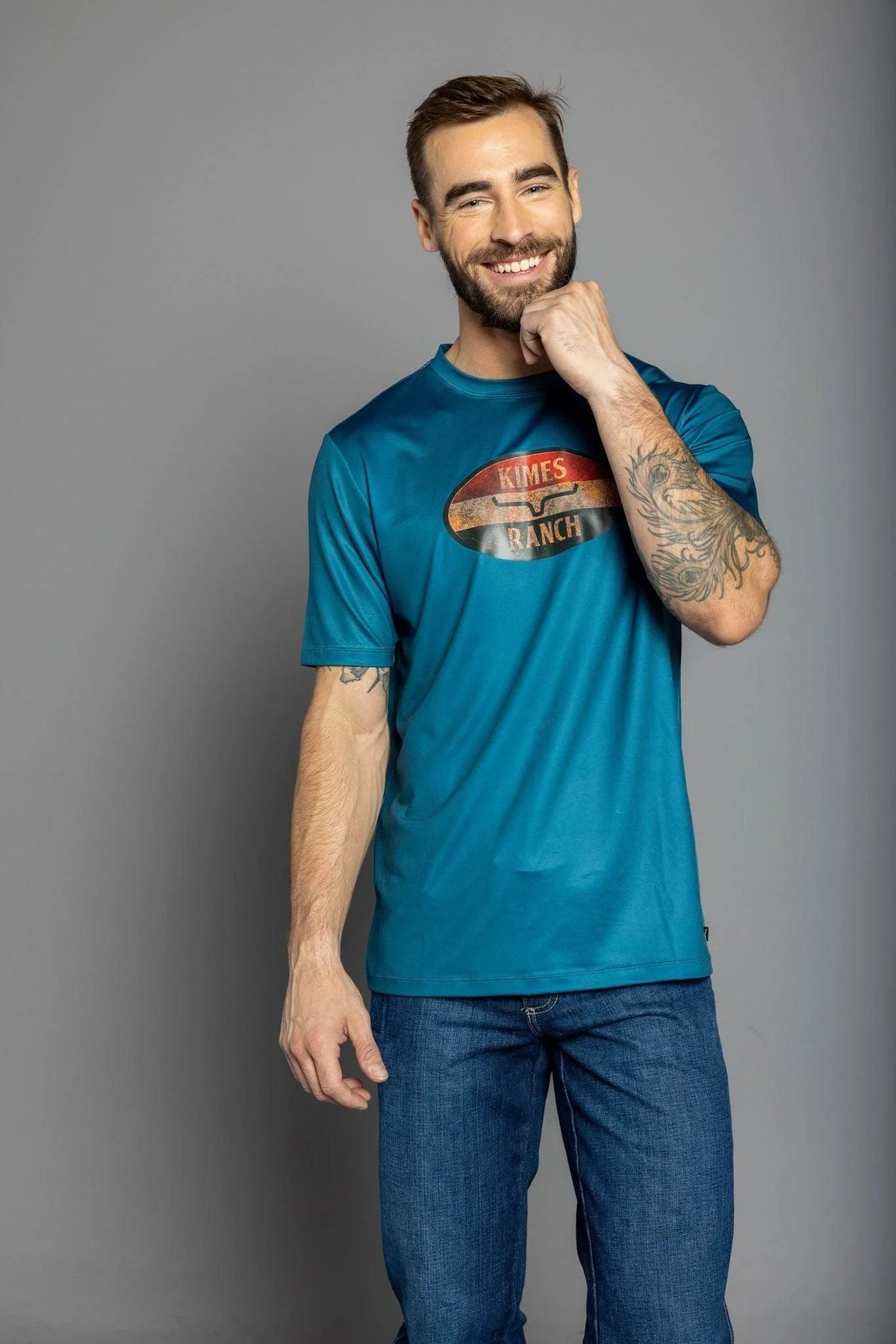 Kimes Ranch American Standard Tech T-Shirt in Dark Blue with a vintage oval Kimes Ranch logo on the chest