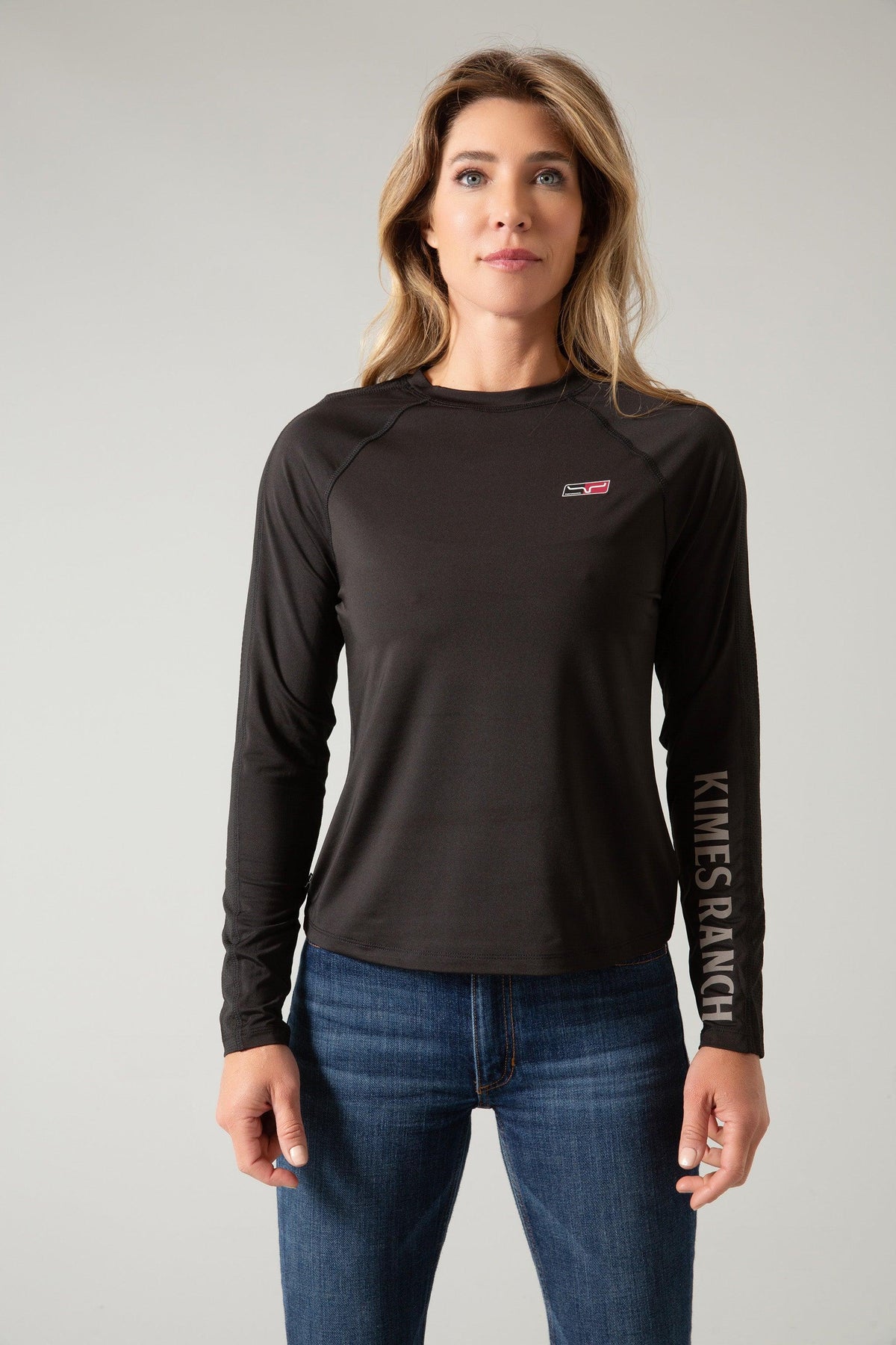 Kimes Ranch K1 Ls Tech Tee Shirt in Black with a small chest logo and Kimes Ranch text down the left sleeve