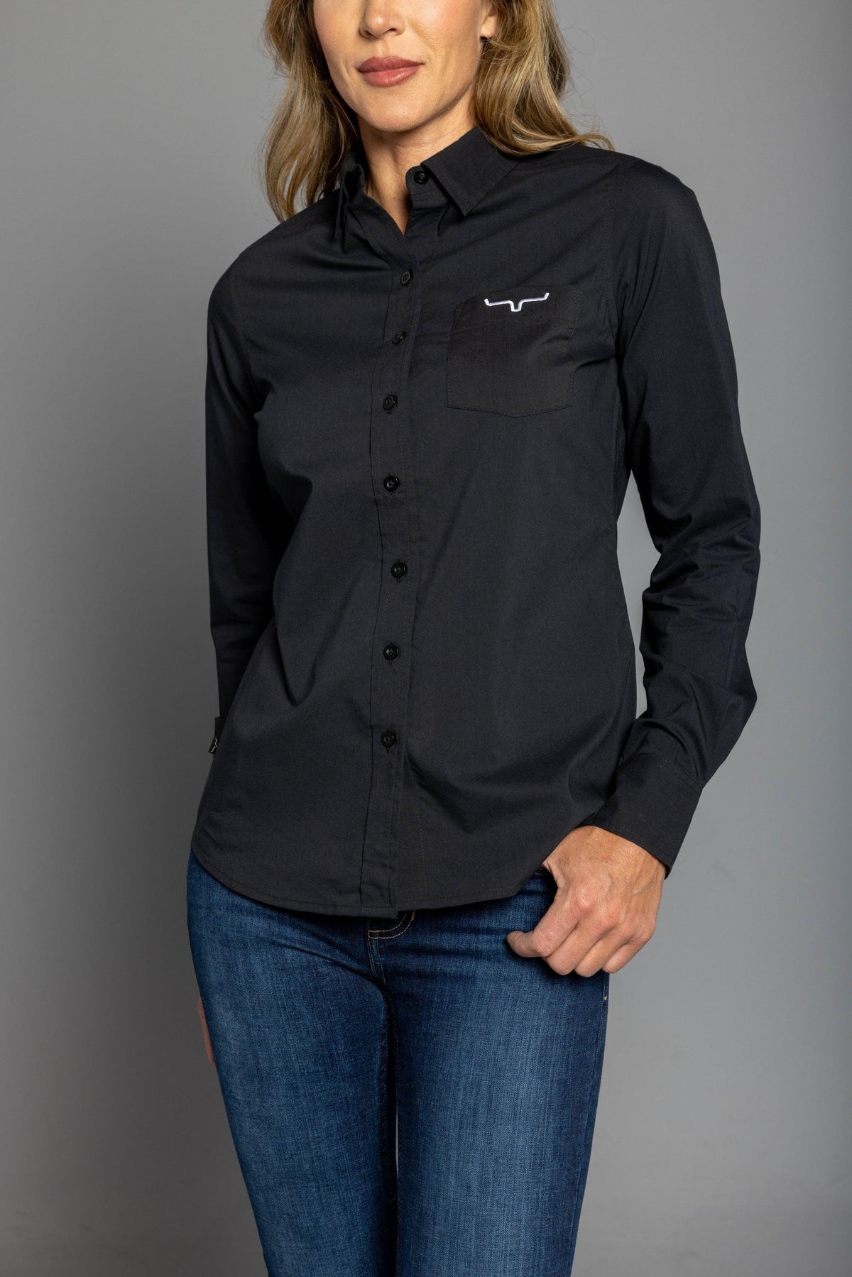 Kimes Ranch Ladies KR Team Shirt (Long) in Black with a front pocket and embroidered Kimes Ranch logo