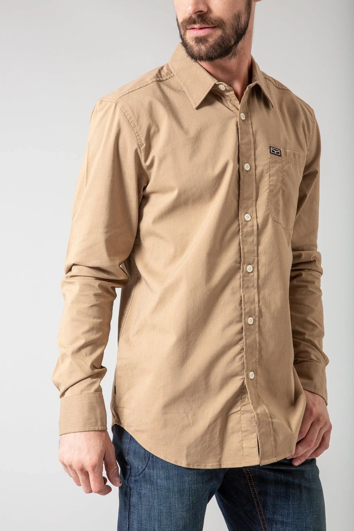 Kimes Ranch Linville Long Sleeve Dress Shirt in Tan with a button-down collar and chest pocket with logo