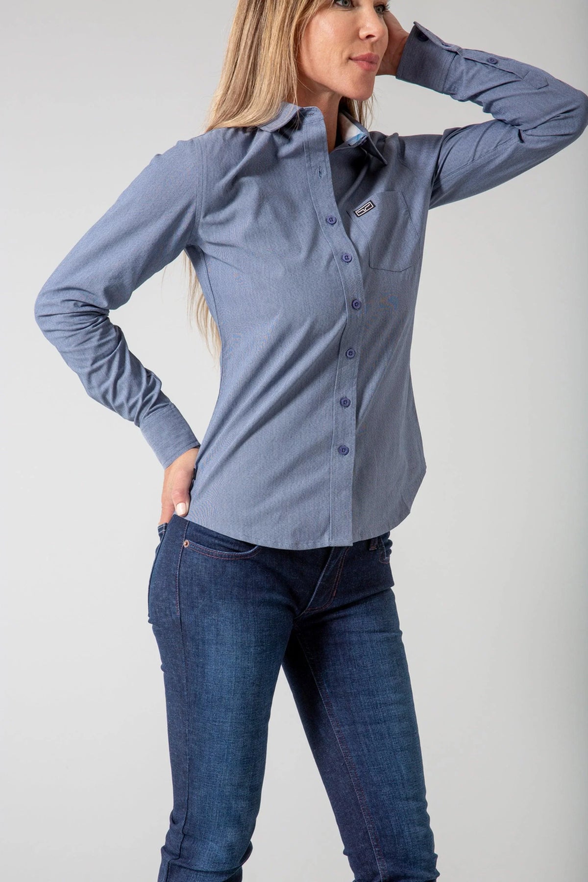 Kimes Ranch Ladies Linville top in Navy, side view, with long sleeves and a chest pocket
