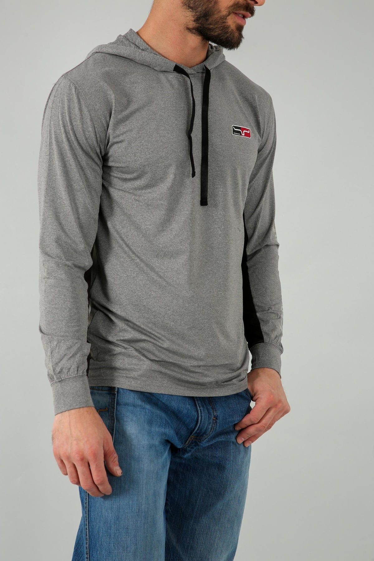 Kimes Ranch Ninja Hood Tech Tee Shirt, side view, in heather grey with black drawstrings and a chest logo