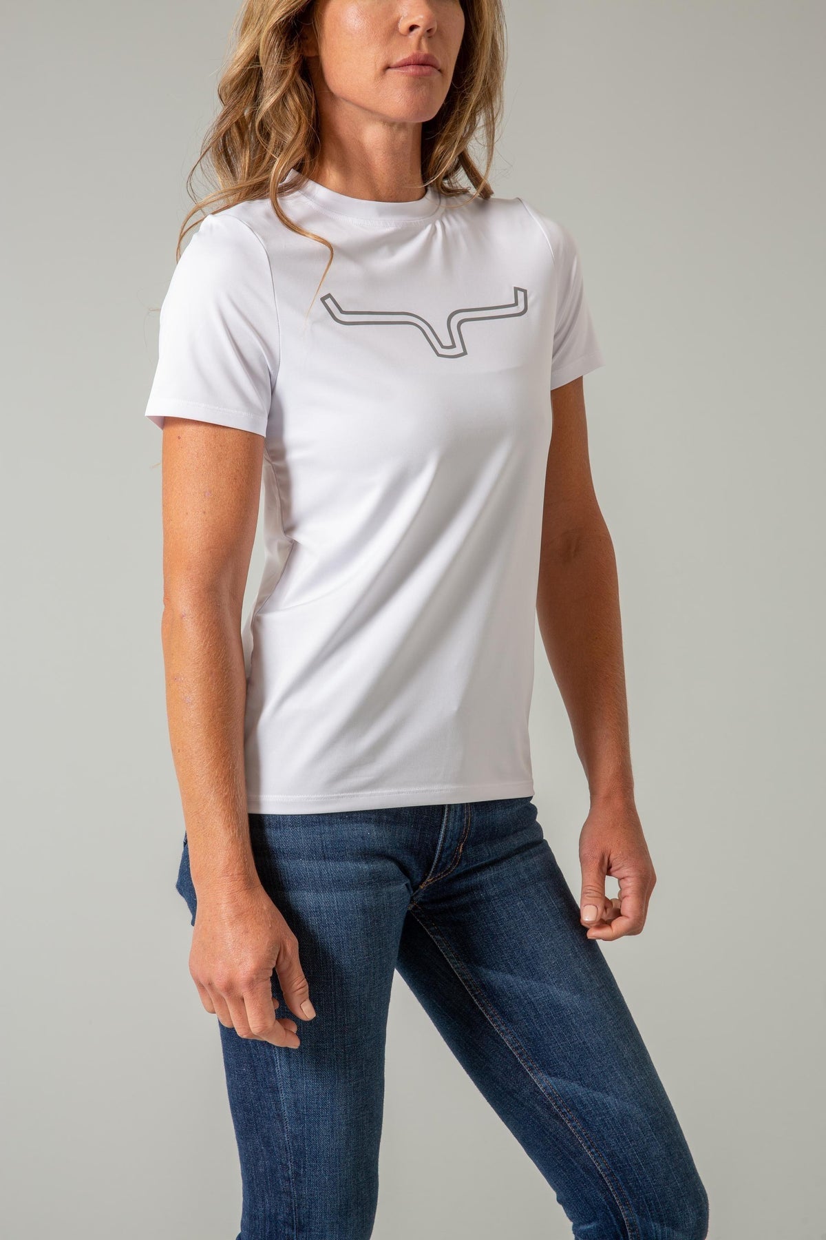 Kimes Ranch Ladies Outlier Tech Tee Shirt in White with a grey logo on the chest