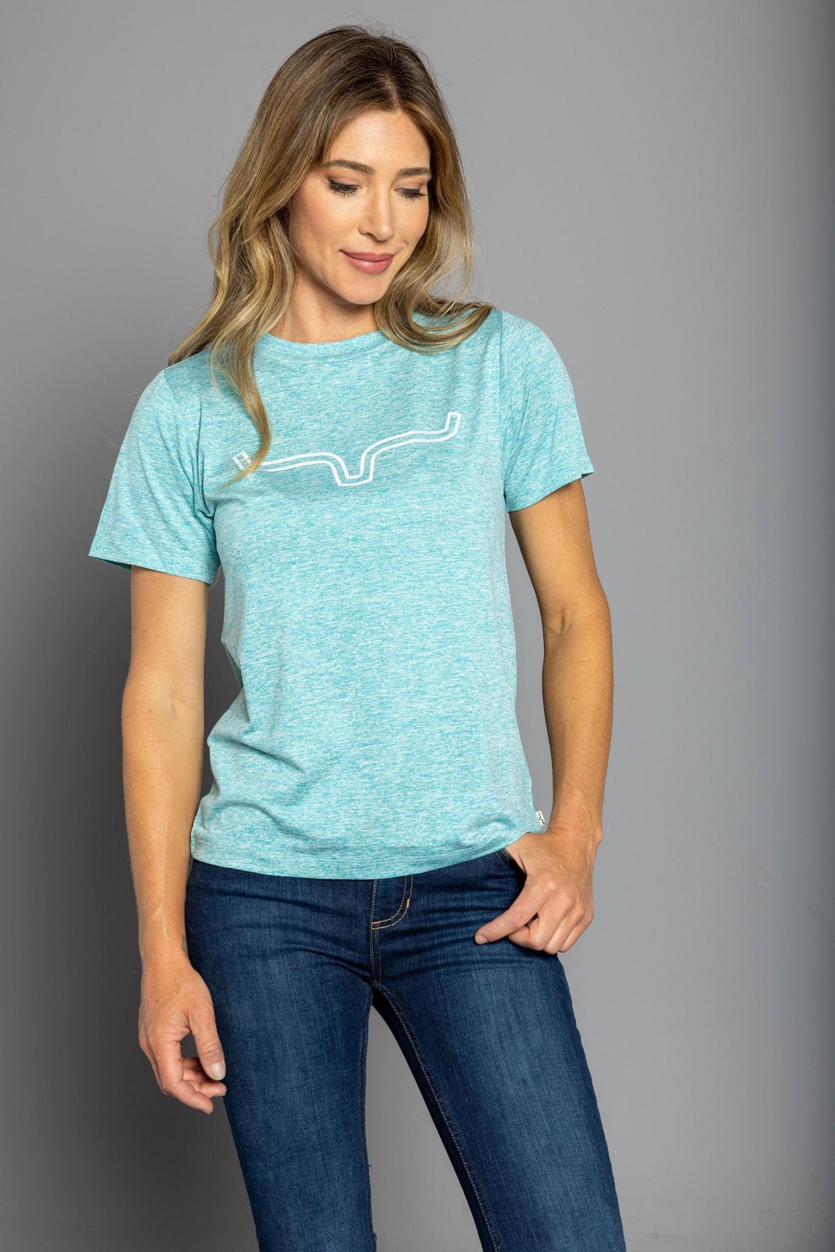 Kimes Ranch Ladies Outlier Tech Tee Shirt in Light Blue Heather with a white outline graphic of a longhorn steer on the chest
