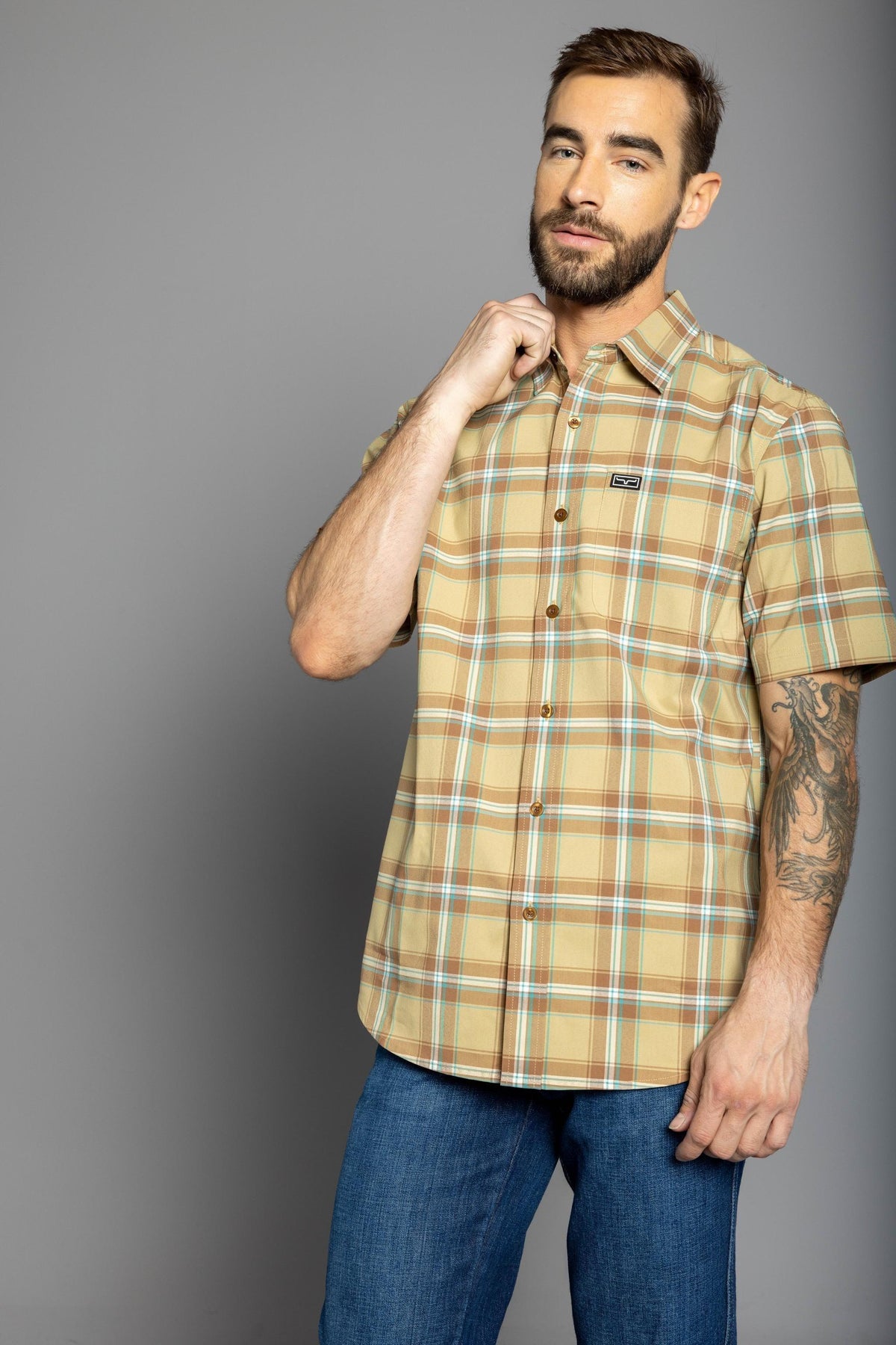 Kimes Ranch 4 Stroke Plaid Dress Shirt in Work Wear Brown with short sleeves and a chest pocket
