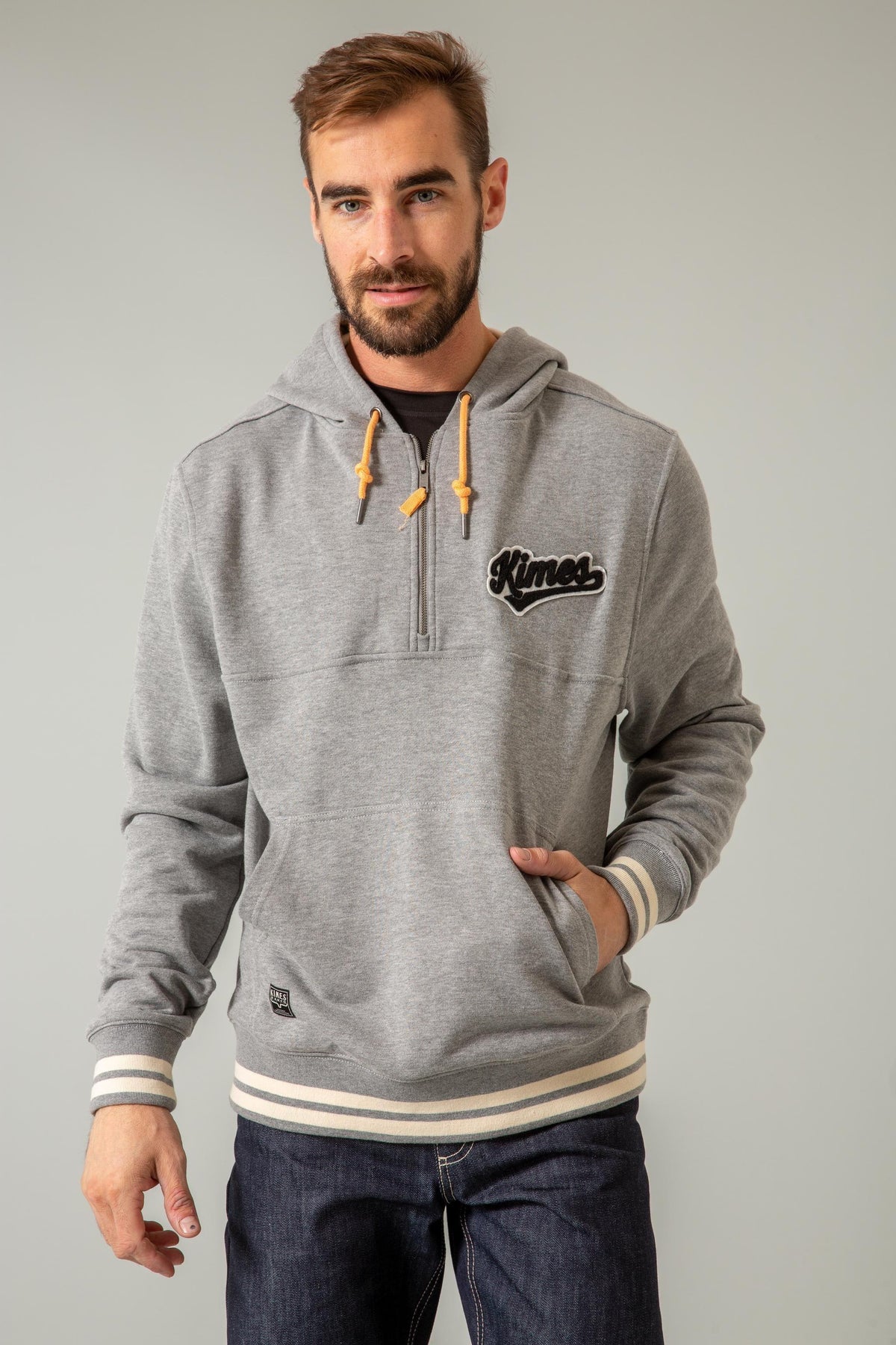 Kimes Ranch Team One Hoodie in Grey Heather with a quarter zip, Kimes Ranch logo, and striped cuffs