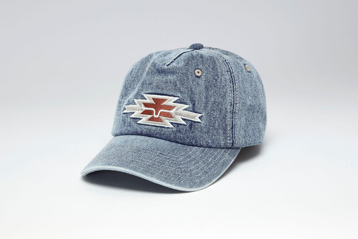 Kimes Ranch Durango hat in Indigo with a red and white embroidered logo on the front
