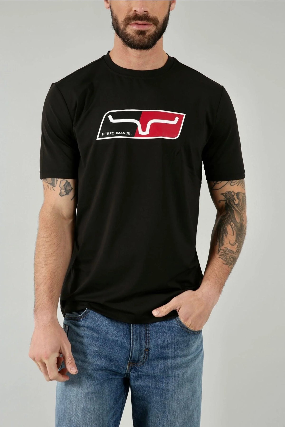 Kimes Ranch Alta Tech Tee Shirt in Black with a red and white PERFORMANCE graphic on the chest