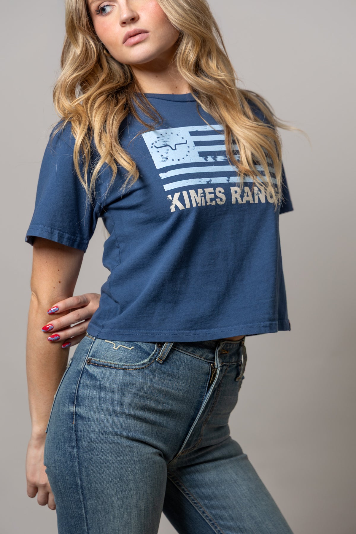 Kimes Ranch 76 shirt in Dark Blue with a distressed Texas flag graphic and Kimes Ranch logo