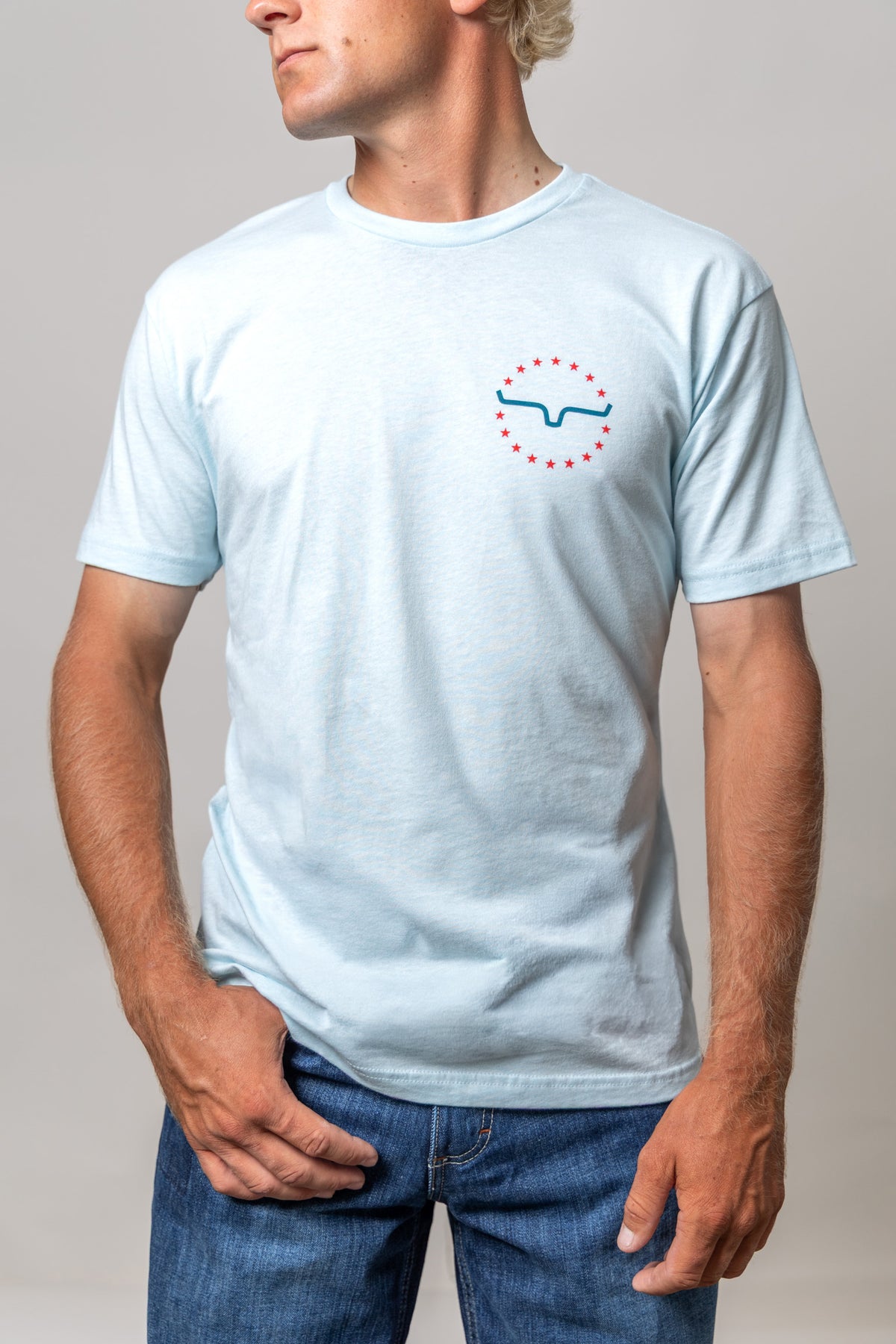 Kimes Ranch 76 shirt in Light Blue with a chest graphic of a blue steer outline surrounded by red stars