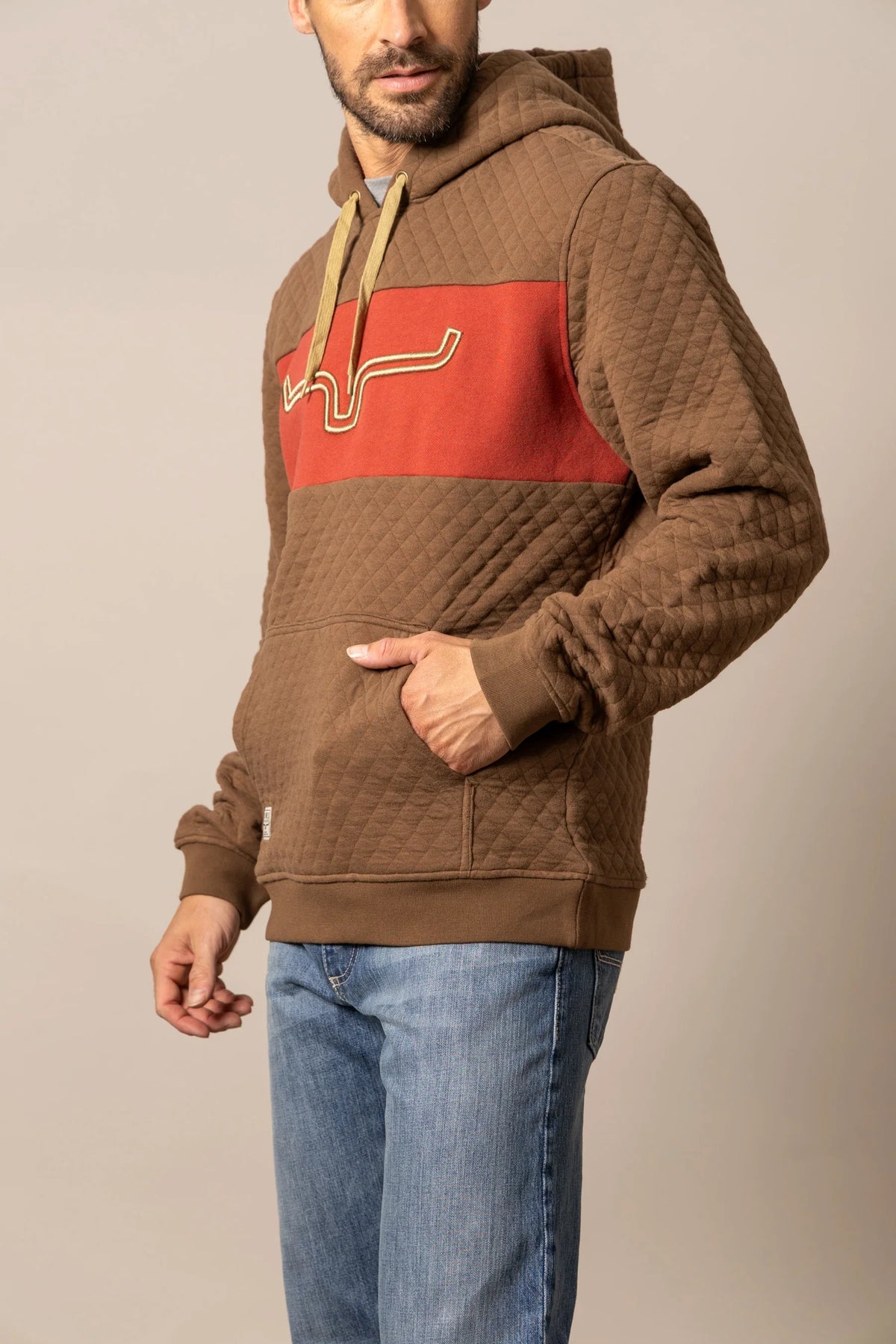 Kimes Ranch AF Ripon Hoodie in Brown, side view, with a red chest panel and the Kimes Ranch logo
