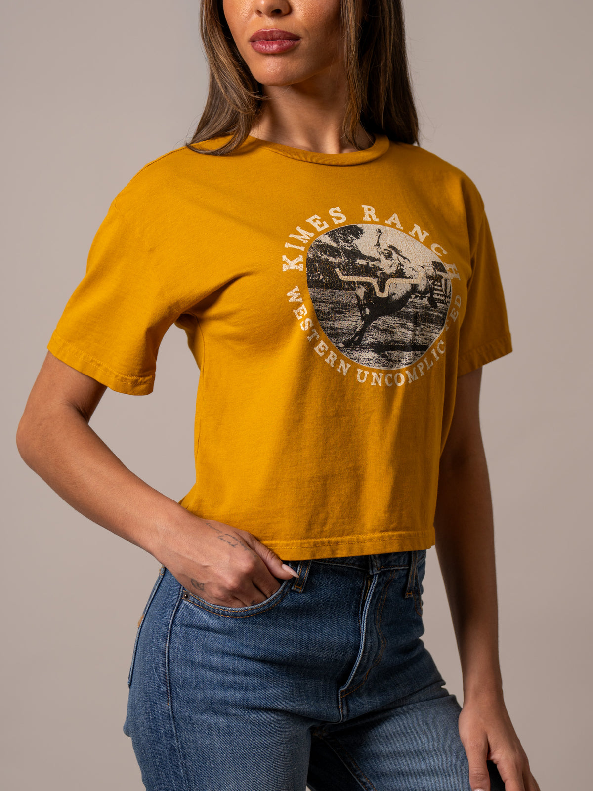 Kimes Ranch Afternoon Rodeo shirt in Gold with a vintage rodeo graphic and Western Uncomplicated text