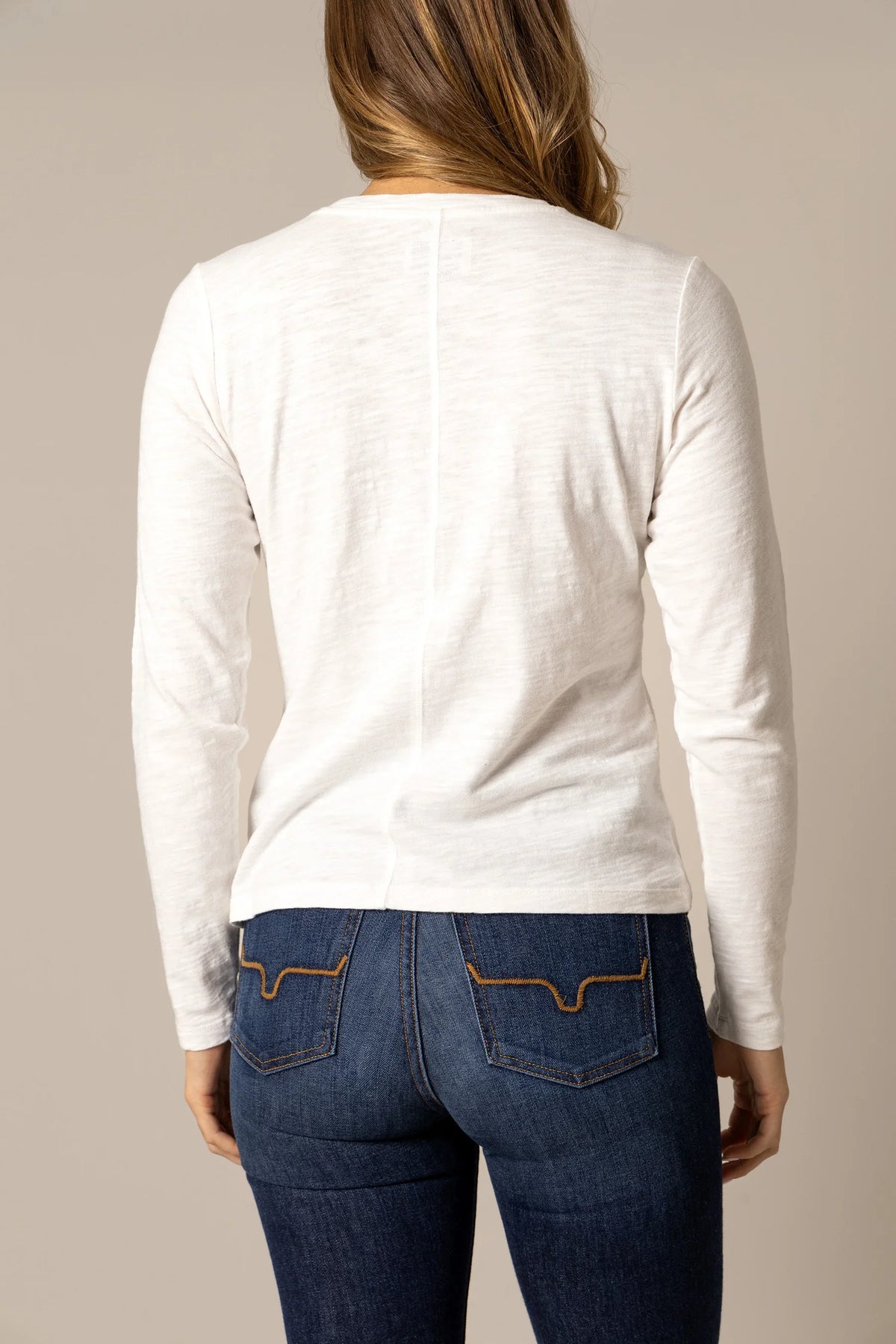 Kimes Ranch Ainsley long sleeve top in Pristine, back view, with a back yoke seam