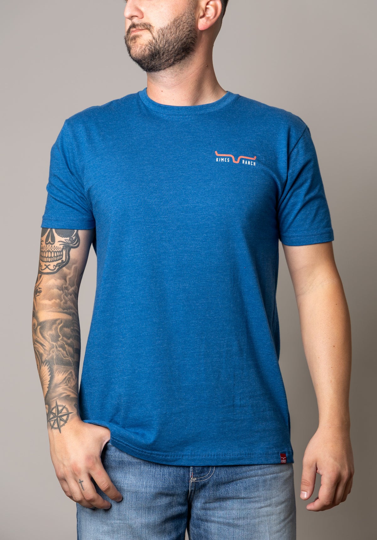 Kimes Ranch American Cowboy shirt in Heather Cool Blue with a chest logo and short sleeves