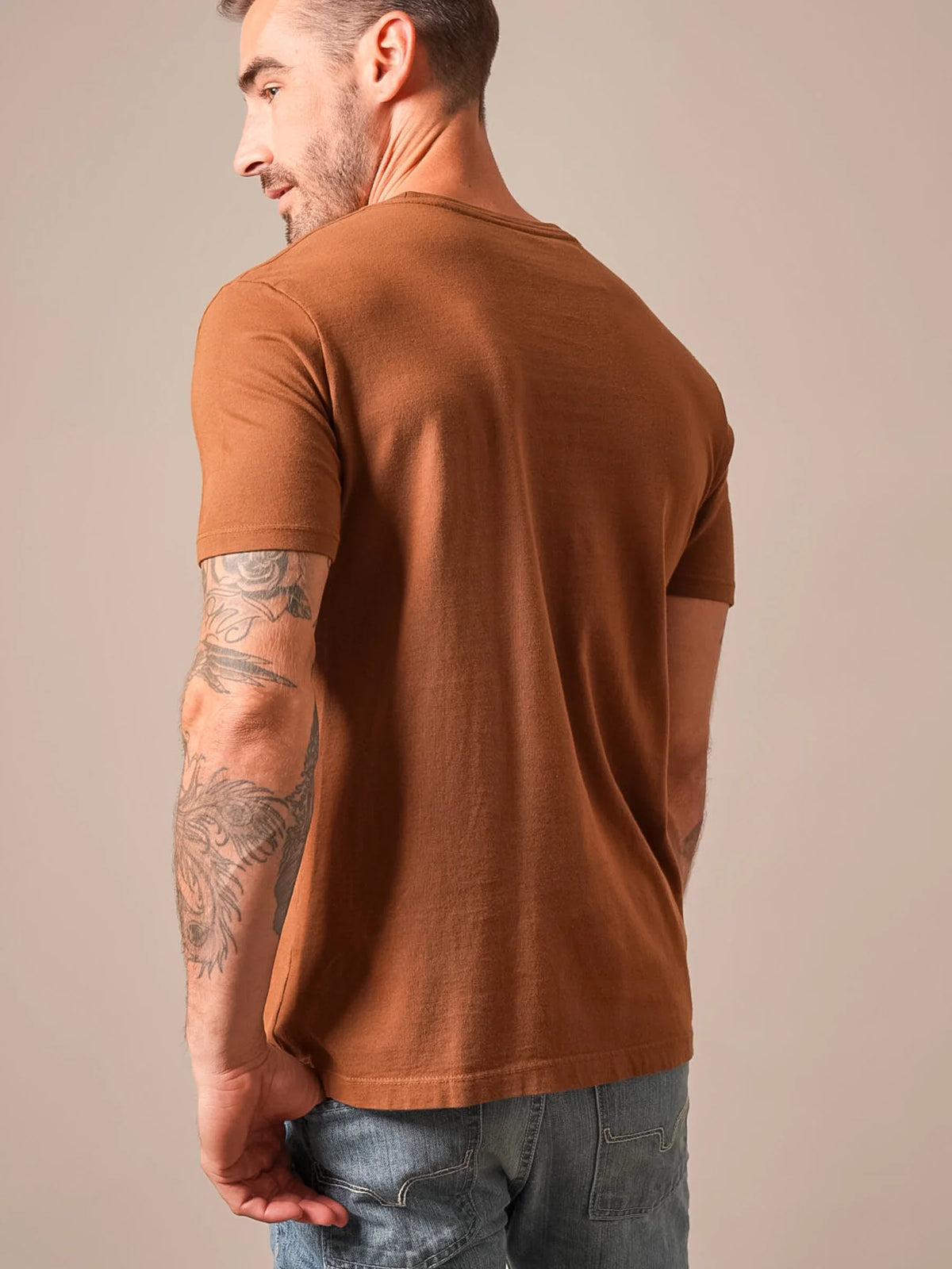 Kimes Ranch Americana 59 shirt in Dark Brown, back view, with short sleeves and a crew neck