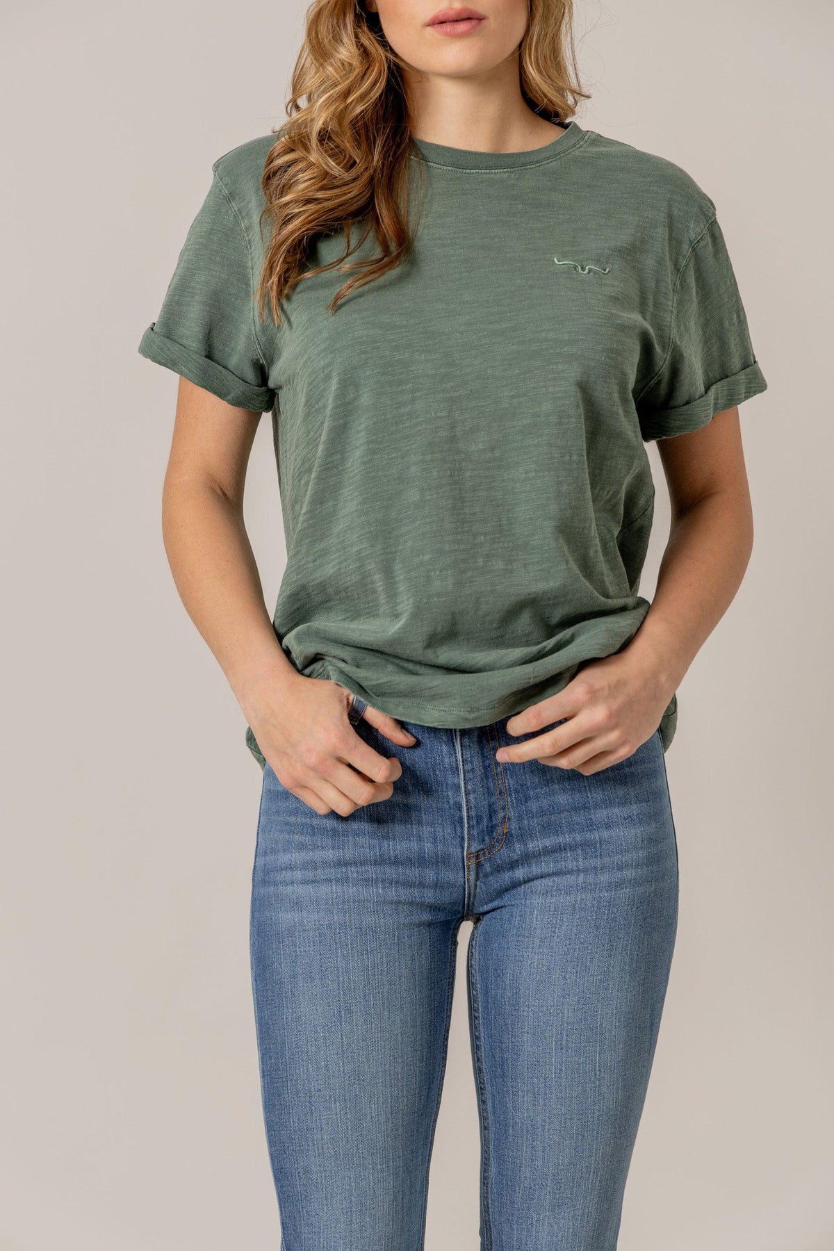 Kimes Ranch Ashley Tee in Pine with rolled short sleeves and embroidered logo on the chest