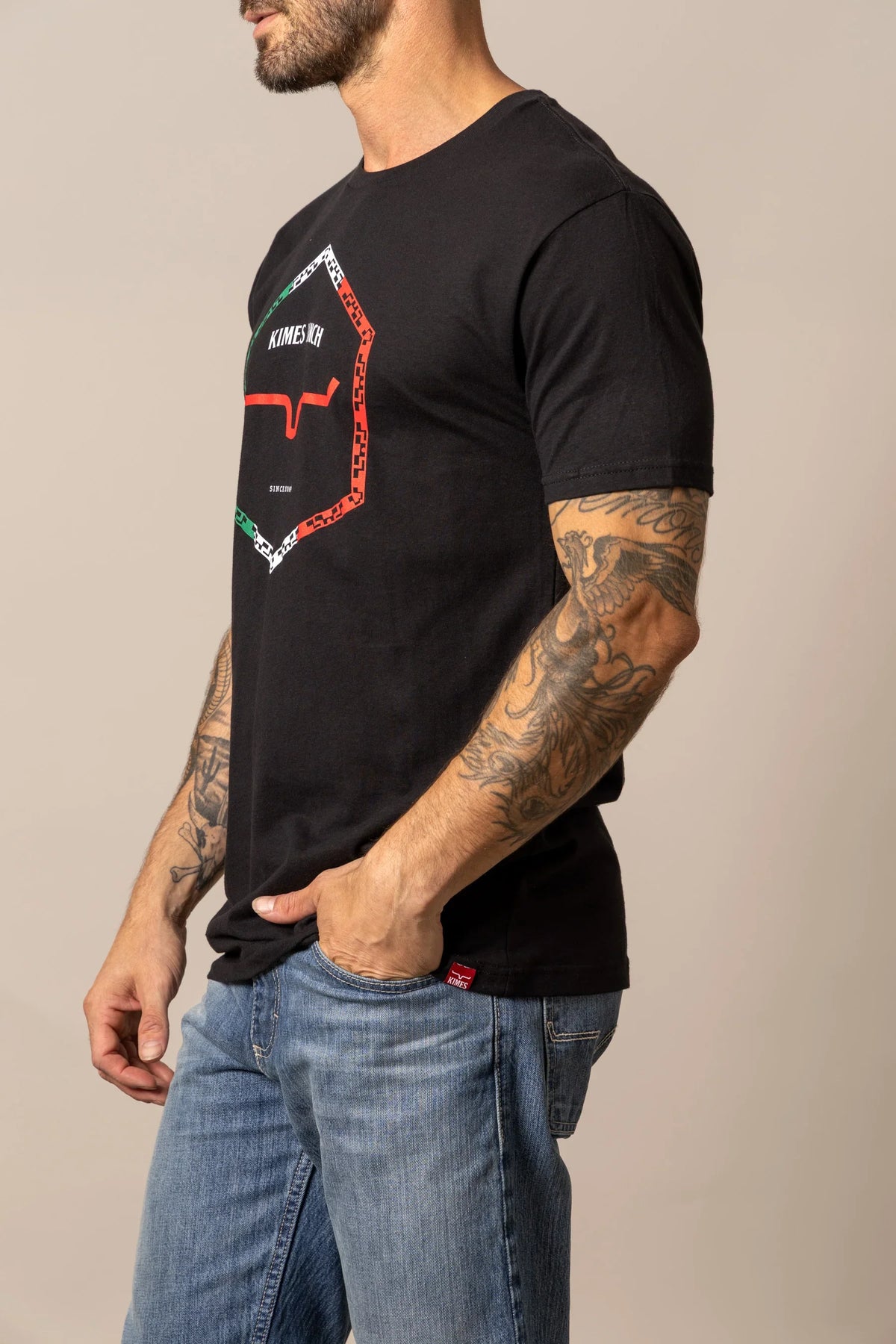 Kimes Ranch Baja Diamond, side view, black short sleeve shirt with hexagonal graphic featuring KIMES RANCH text