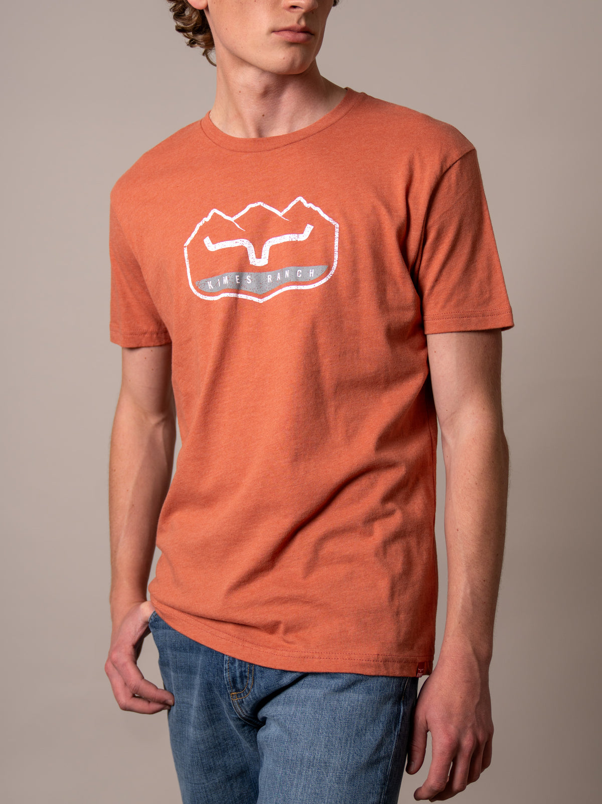 Kimes Ranch Banquet shirt in Heather Redwood with a graphic print of a stylized Kimes Ranch logo and the Kimes Ranch logo