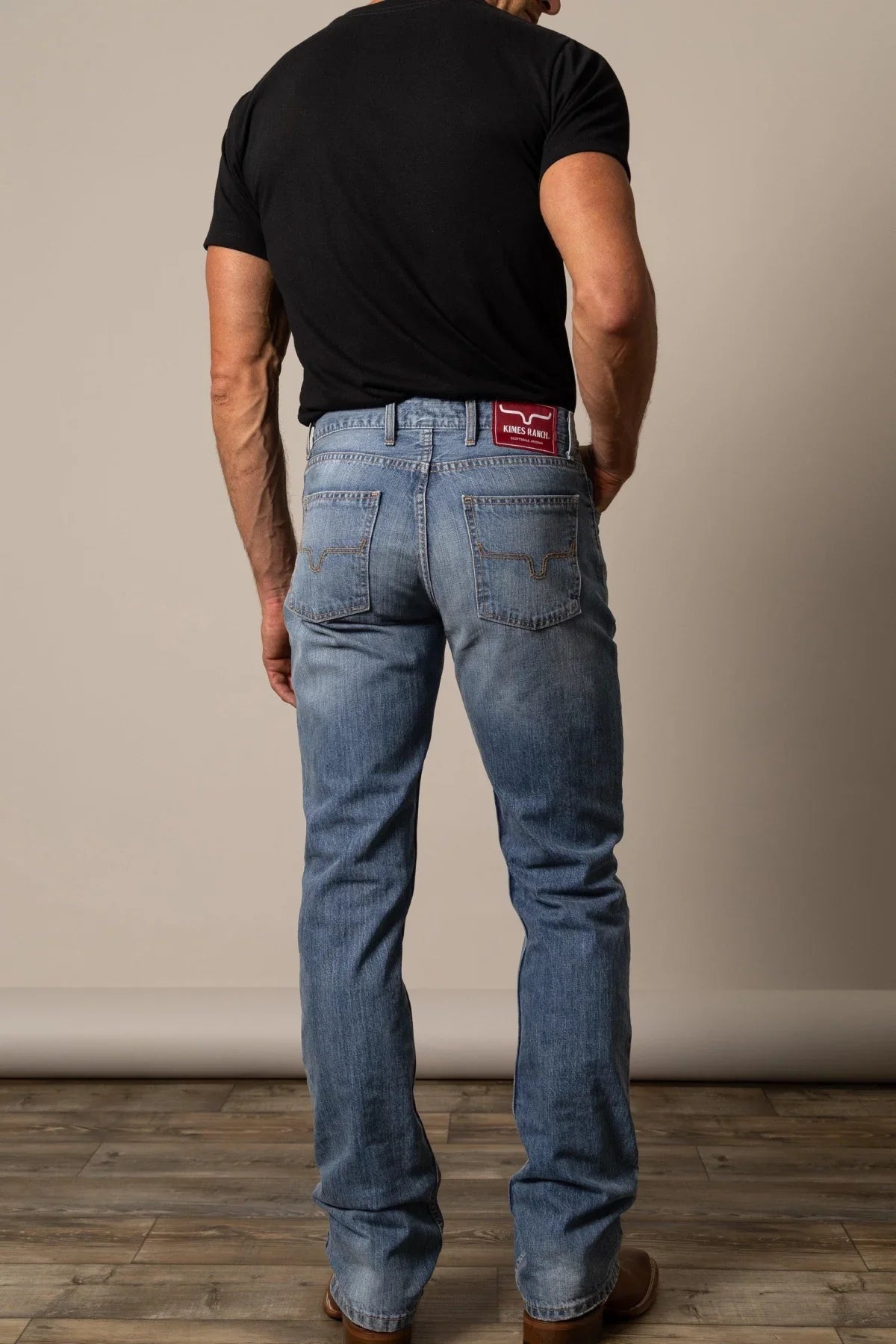 Kimes Ranch Barney Slim Fit Bootcut jeans in blue with back pockets and Kimes Ranch logo