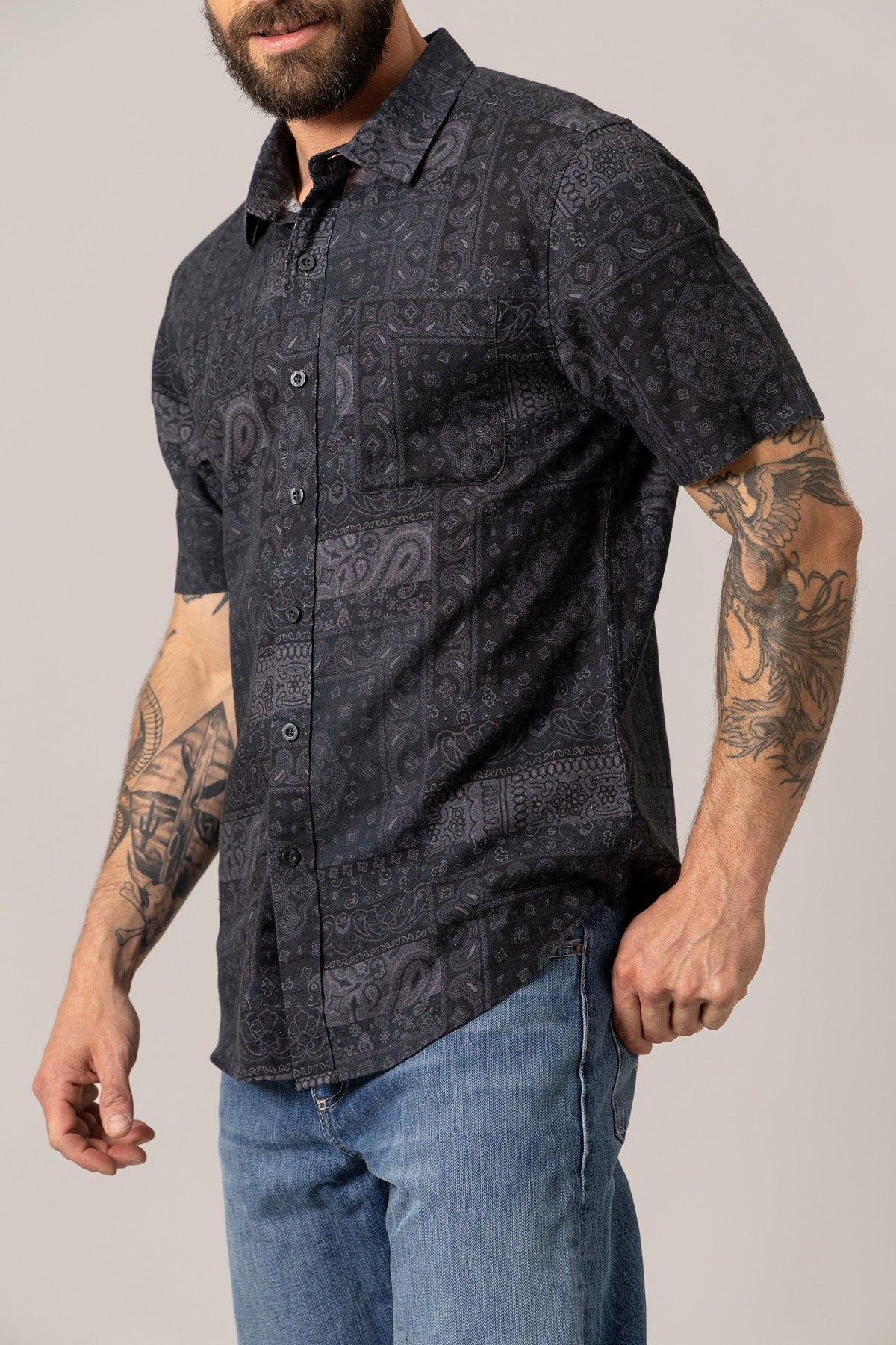 Kimes Ranch Barrett Button Up dress shirt in Black with a short sleeve bandana print and a chest pocket