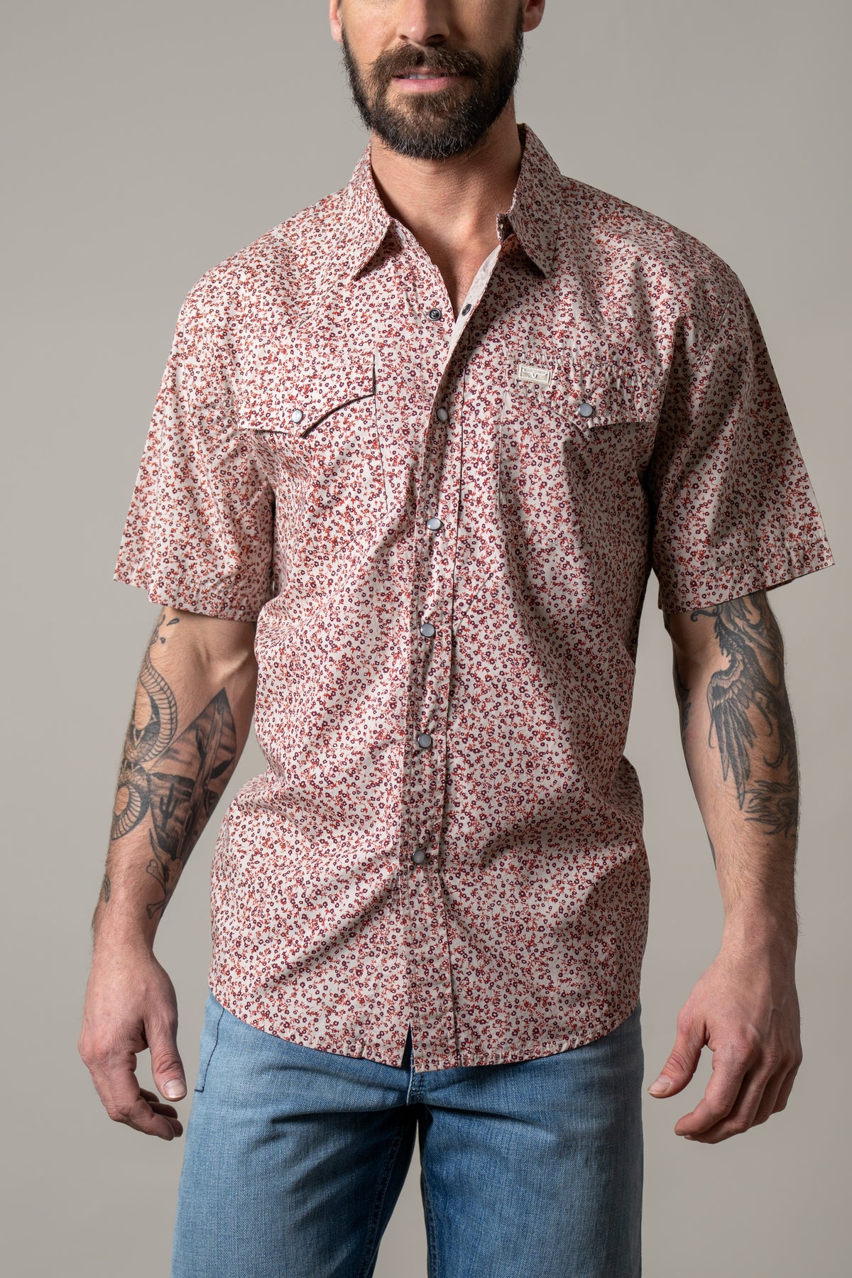 Kimes Ranch Bascom short sleeve button-up dress shirt in Red with a small floral print and two chest pockets