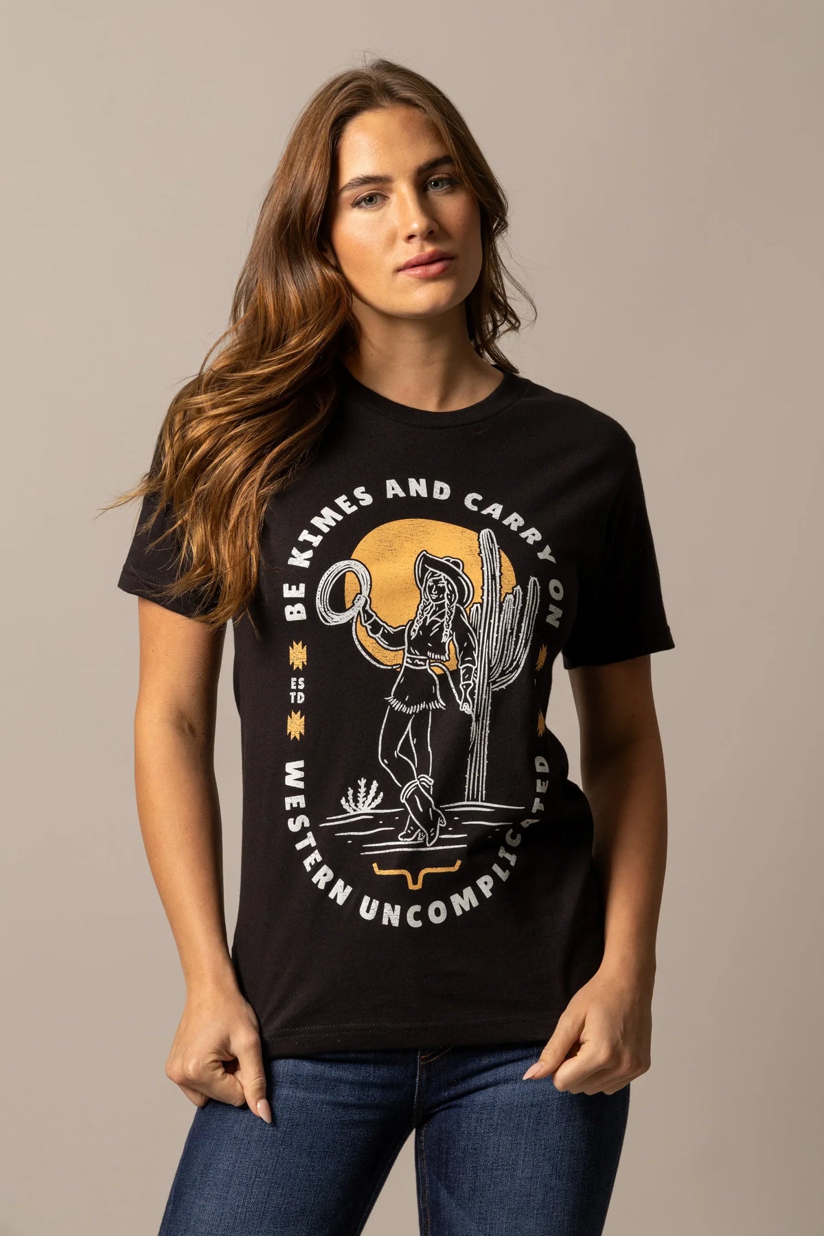 Kimes Ranch Be Kimes shirt in Black with a graphic of a woman in a cowboy hat and text reading Be Kimes