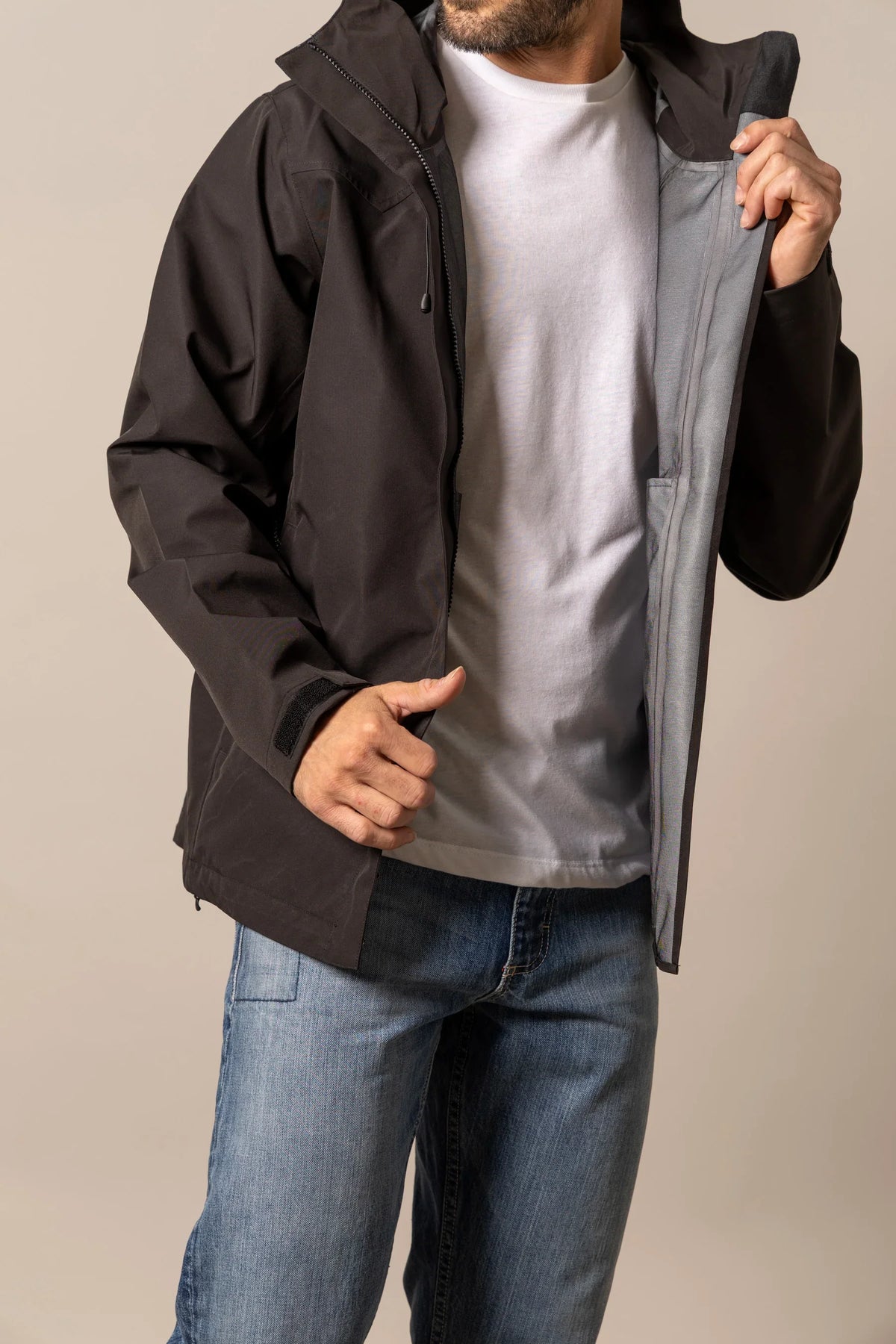 Kimes Ranch Beartooth Shell jacket in Black with a grey interior lining and adjustable cuffs